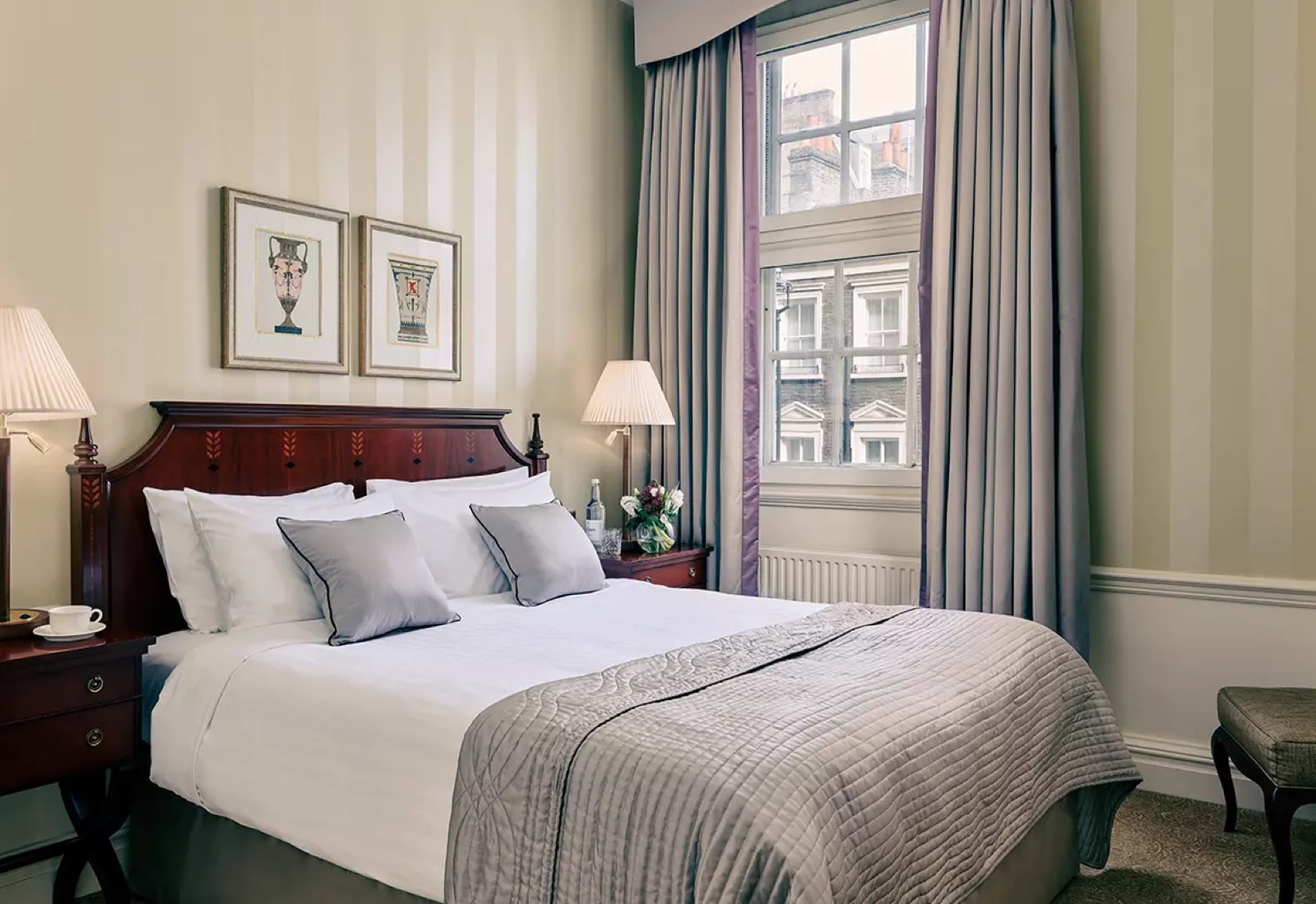 Bedroom with inlaid mahogany headboard