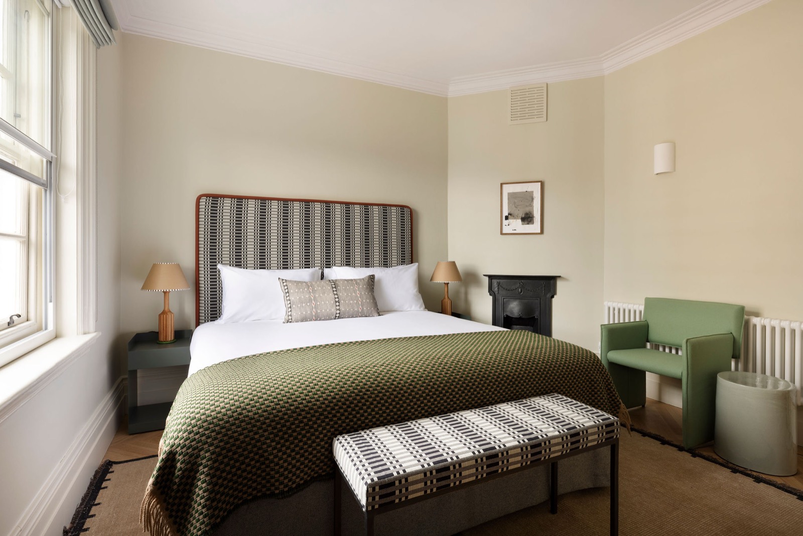 Principal bedroom with cast-iron fireplace