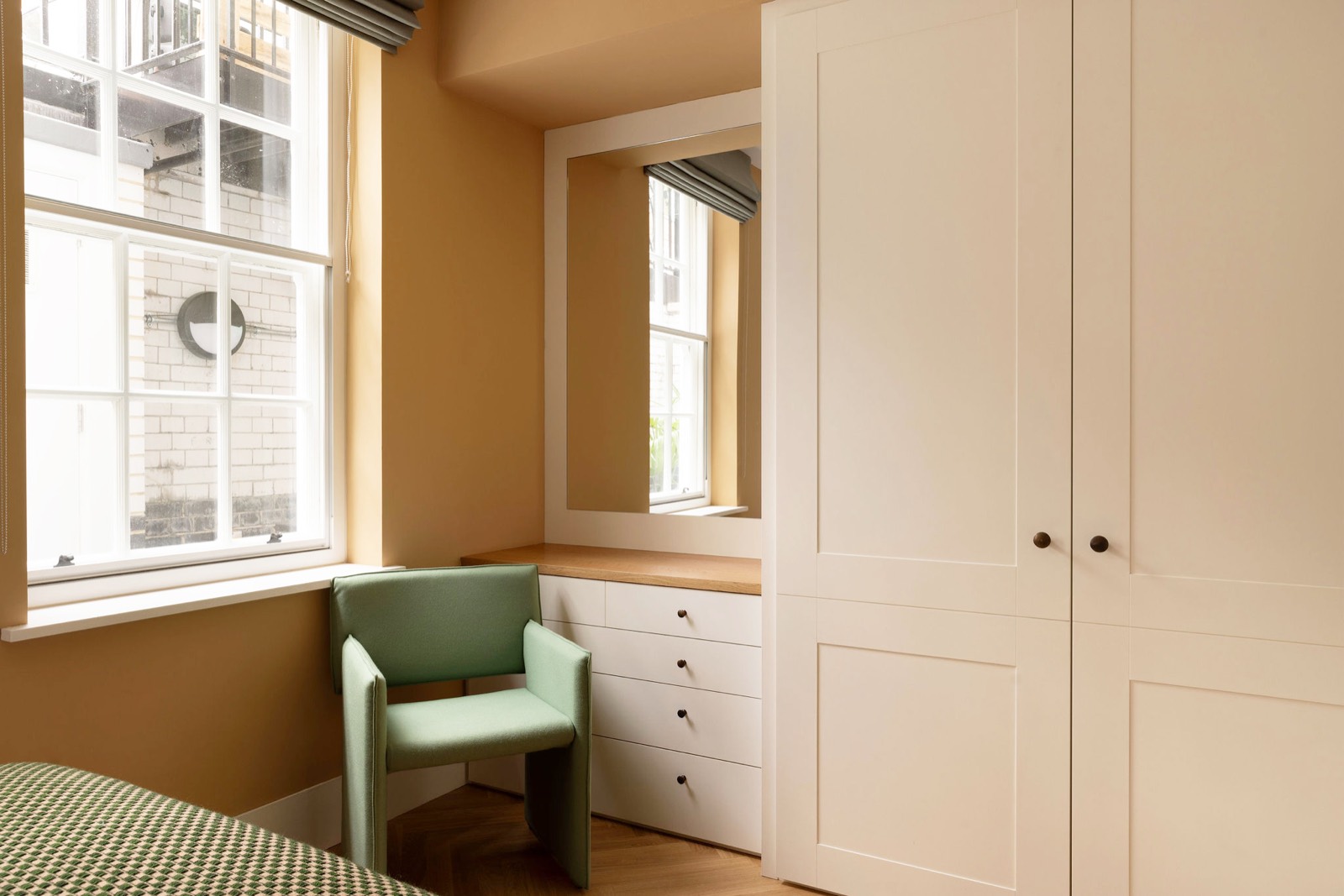 Dressing table and fitted wardrobes in the bedroom