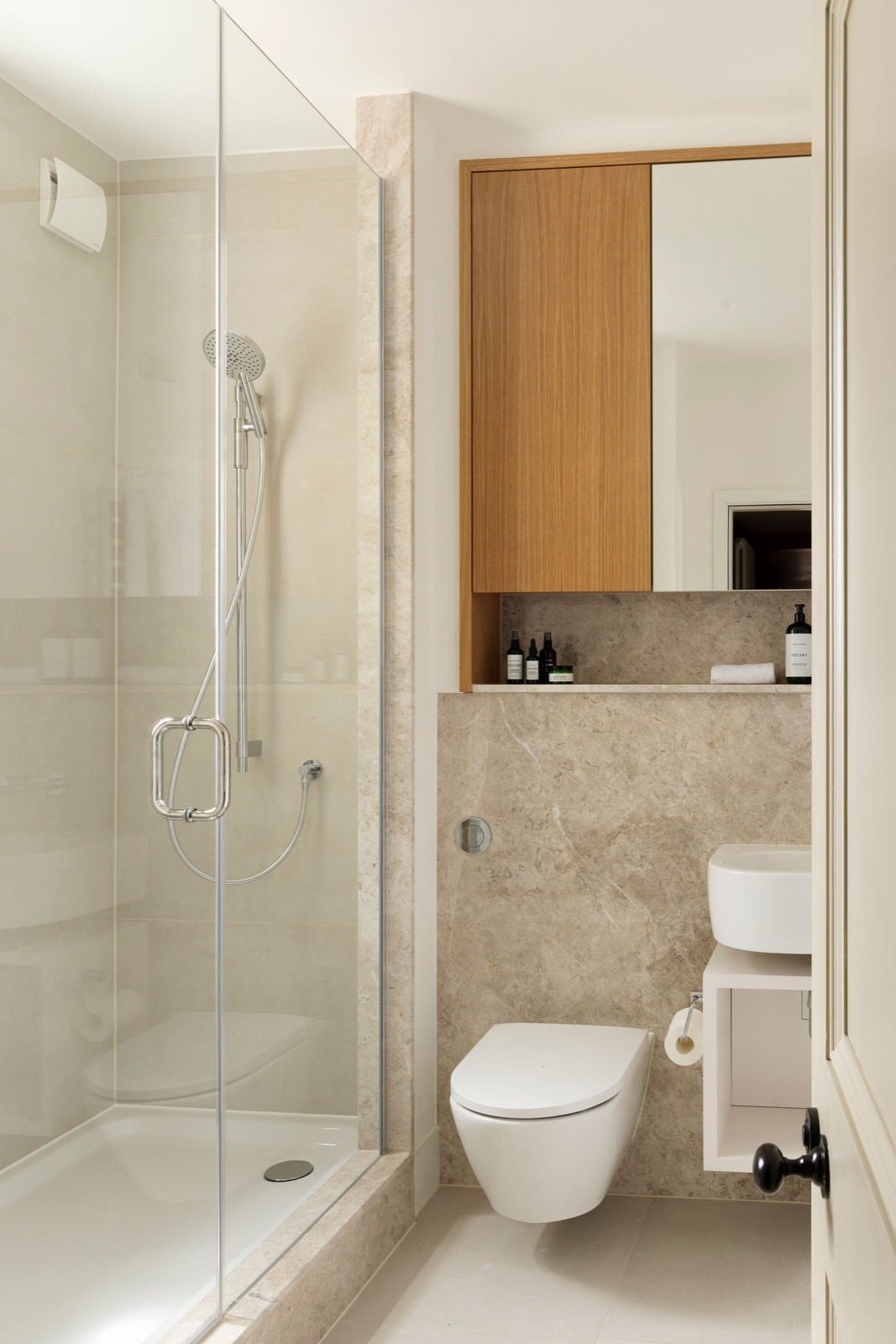Walk-in shower and wall-hung basin