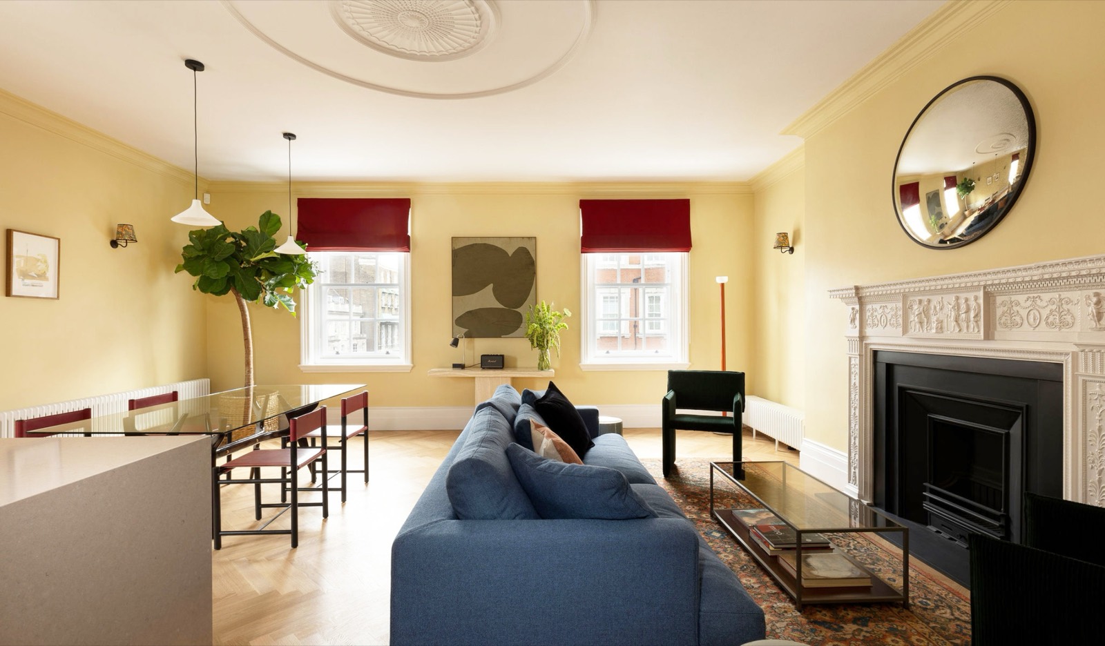 Drawing room with carved fireplace and ceiling rose