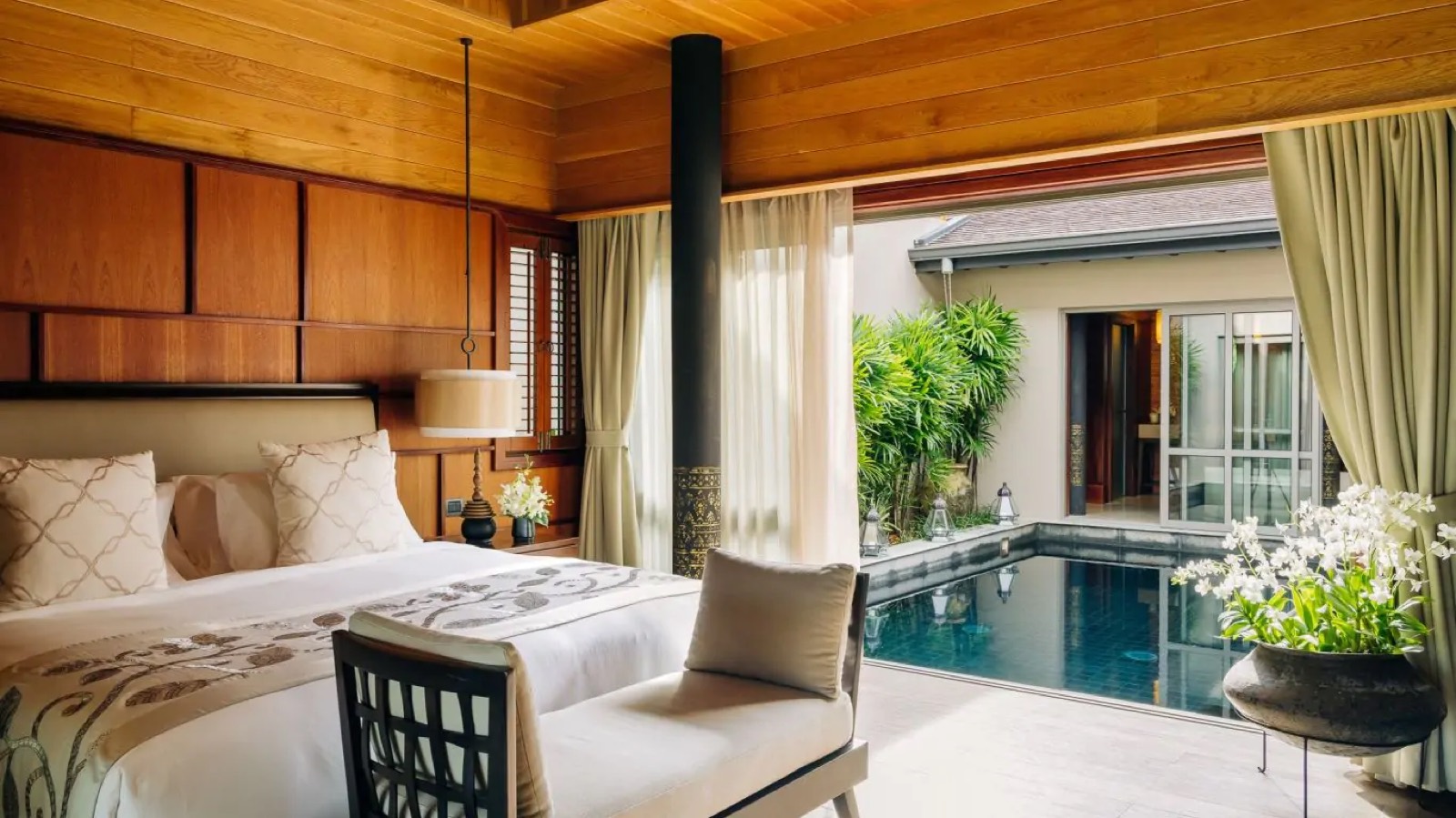 Bedroom opening to its own plunge pool