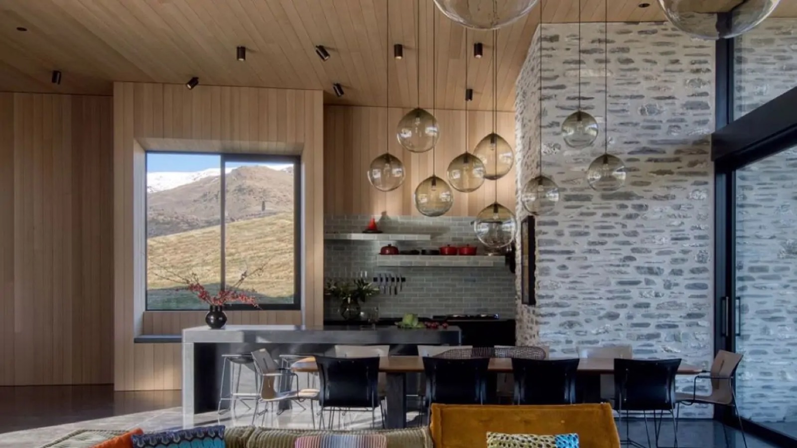 Kitchen and dining under glass globe pendants