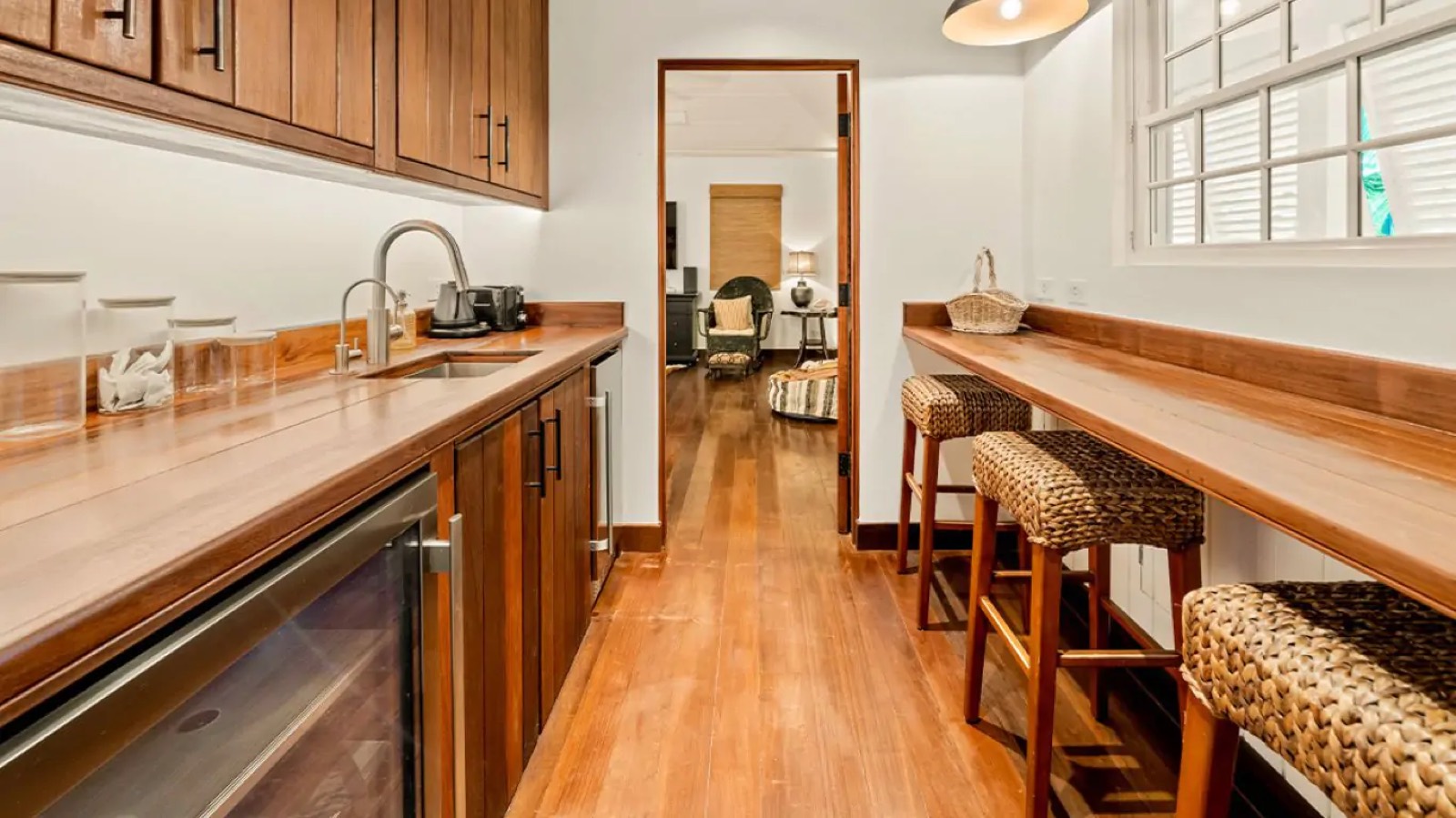 Pantry bar with wine fridge and stools