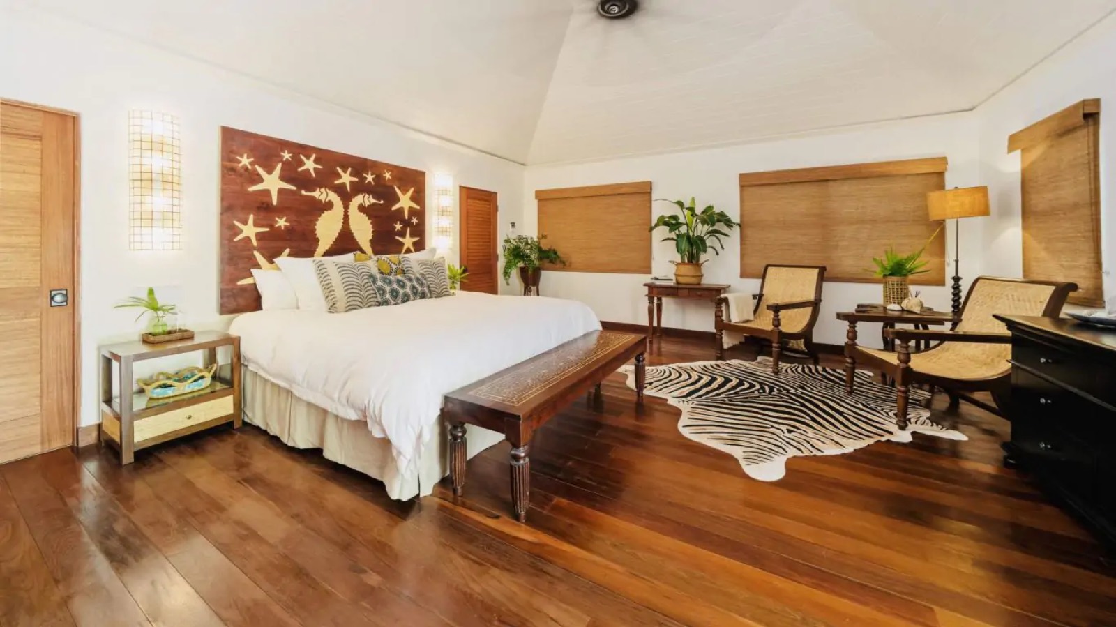 Bedroom with carved starfish headboard