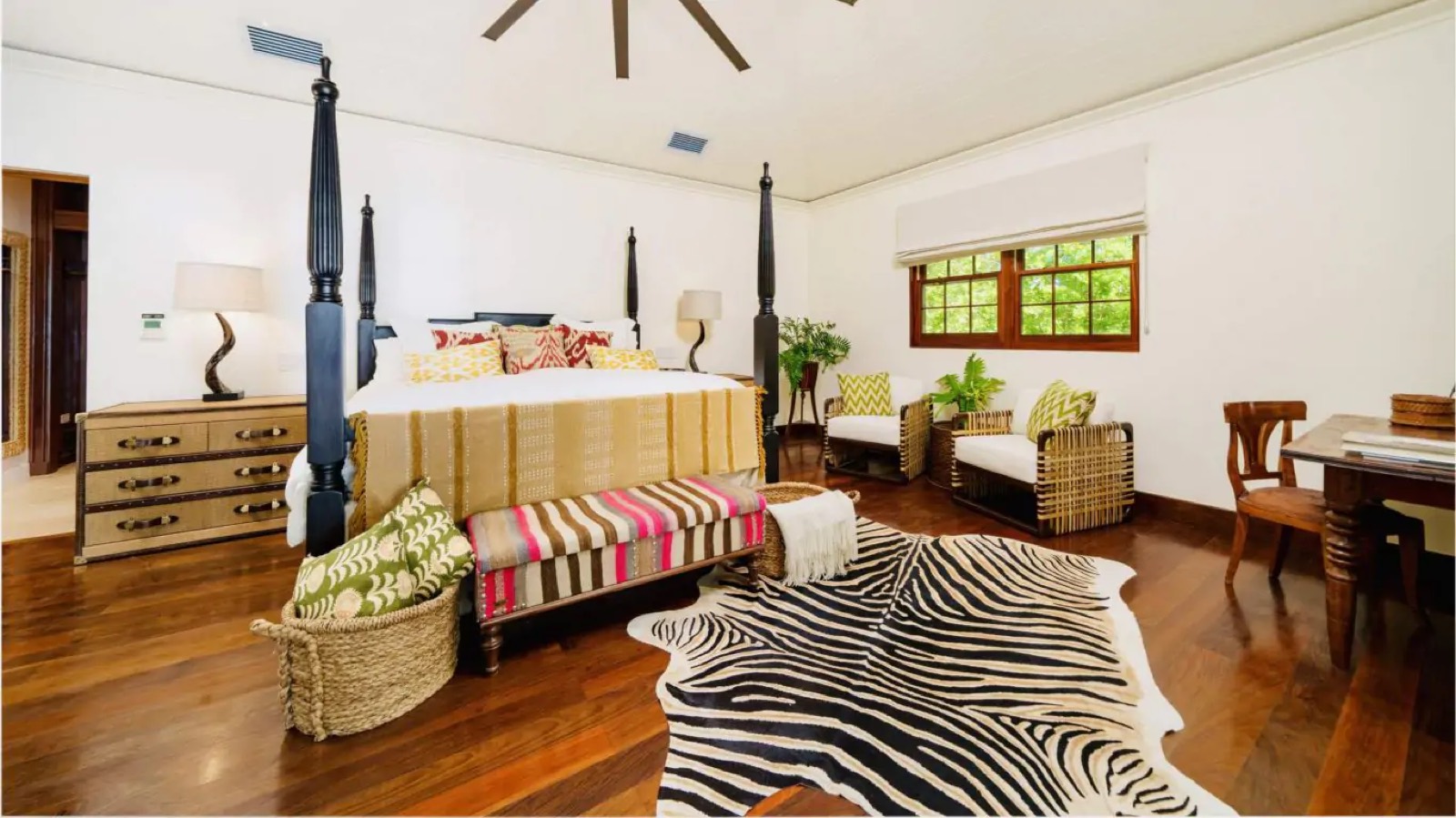 Bedroom with dark four-poster bed