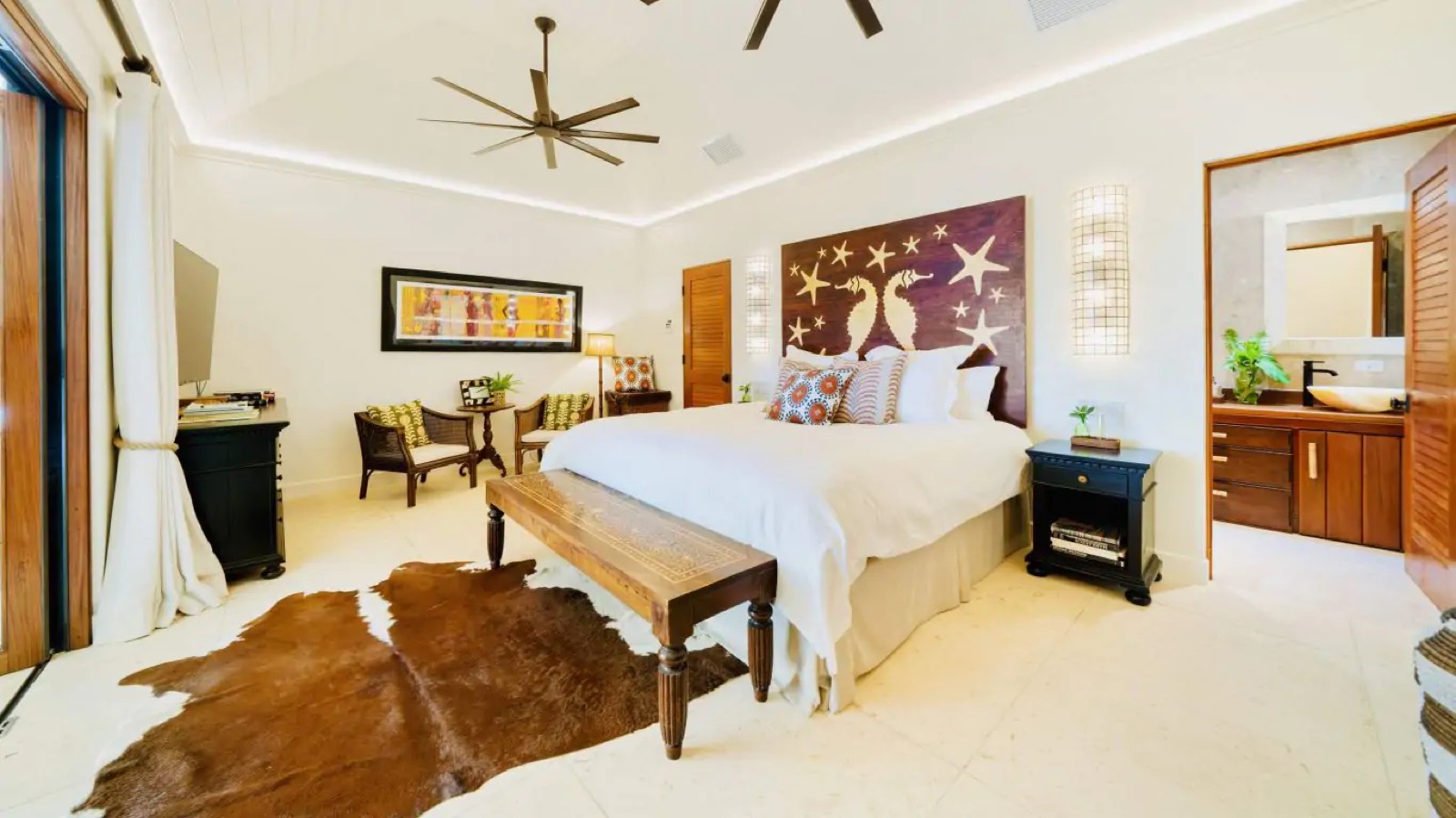 Bedroom with its ensuite bathroom beyond