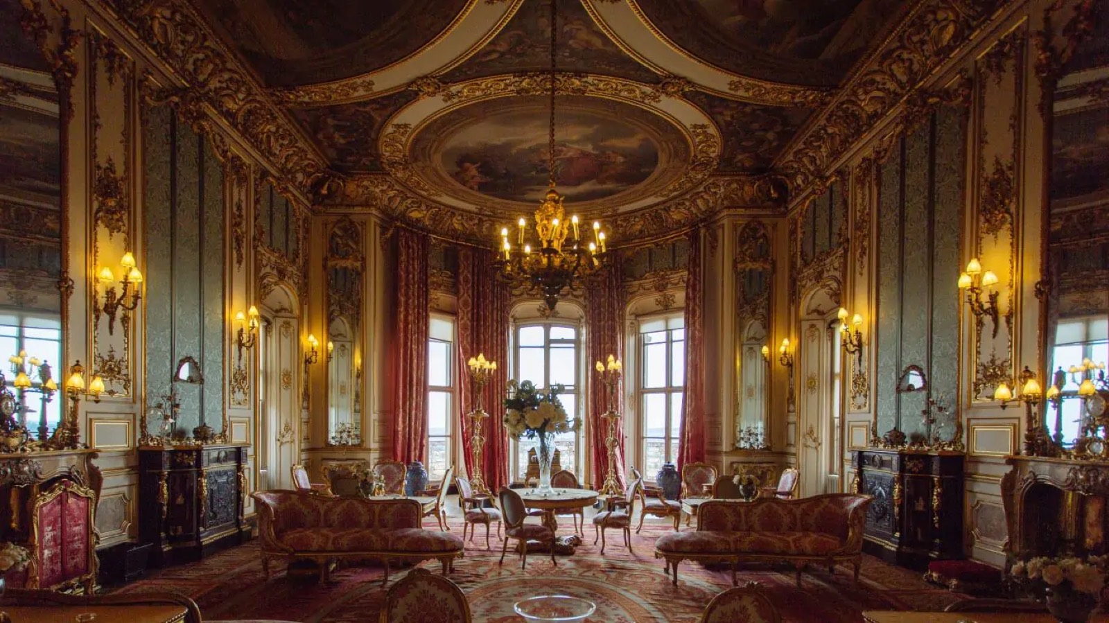 Saloon with painted ceiling and bay windows