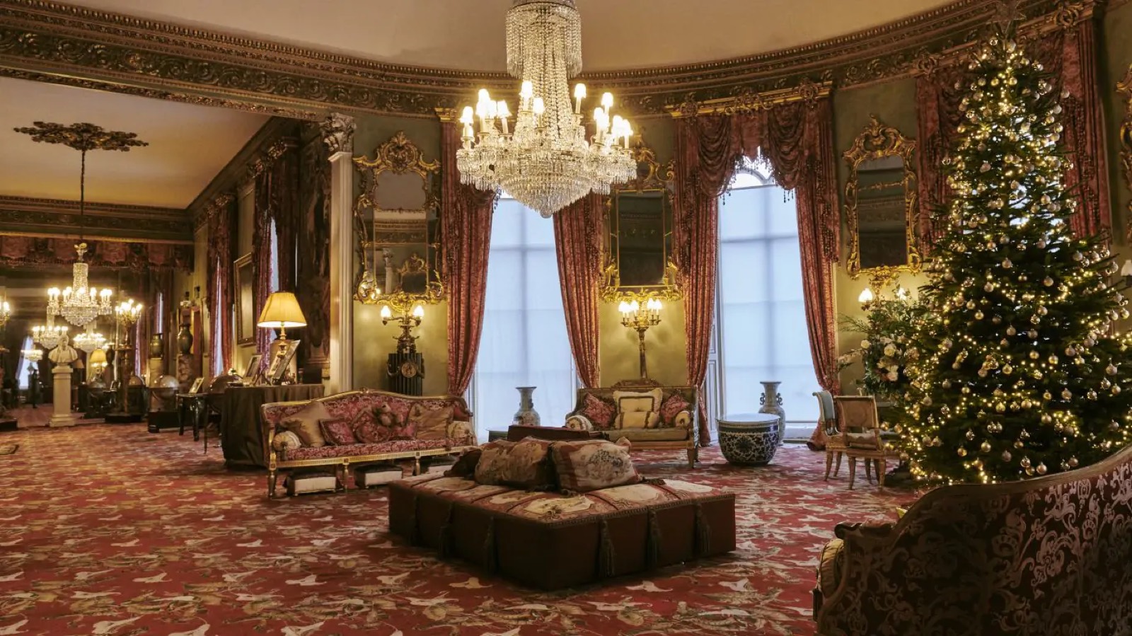 Drawing room with chandeliers, dressed for Christmas