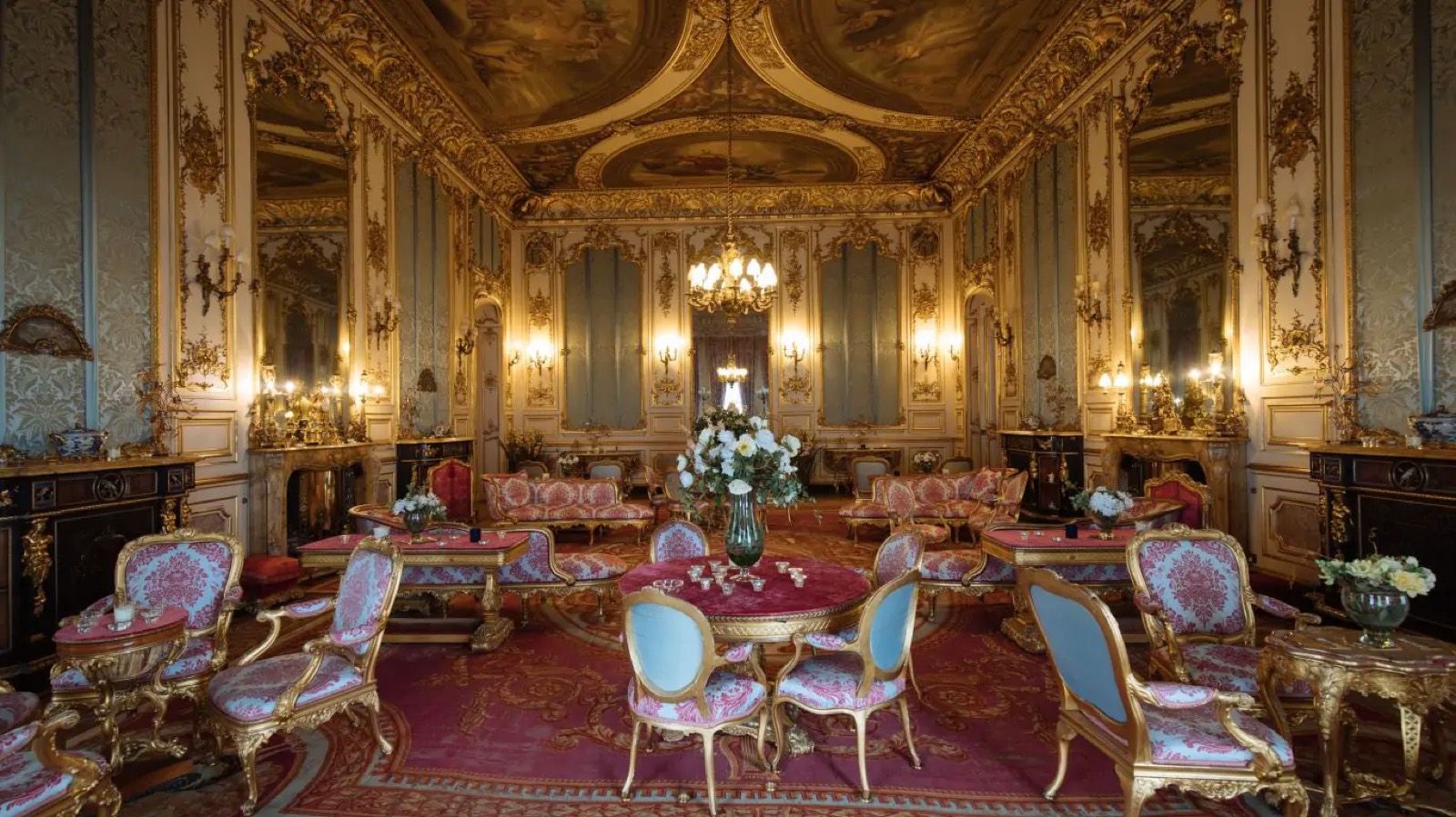 Gilt card tables set in the saloon