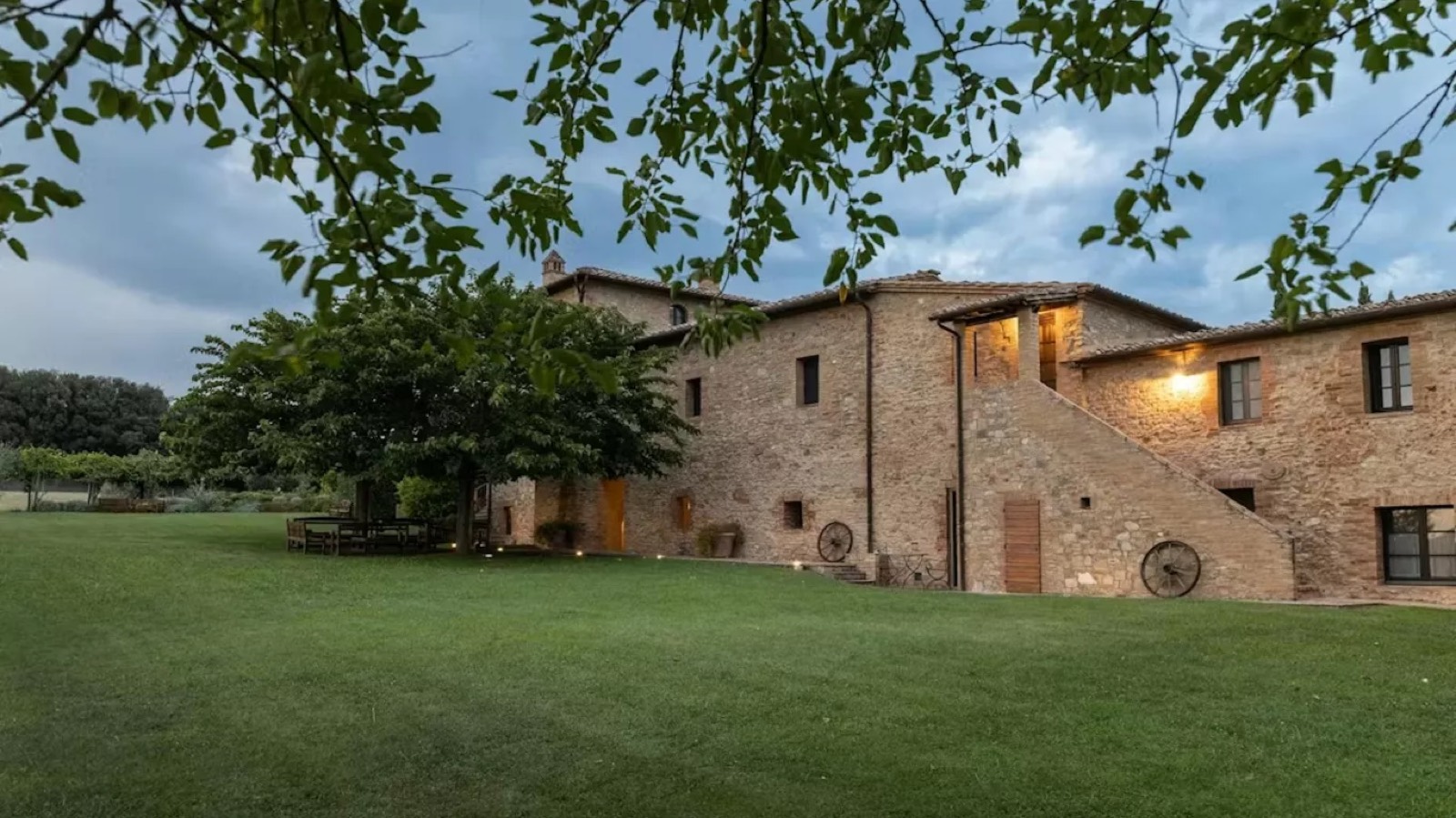 Villa at dusk with external stone staircase