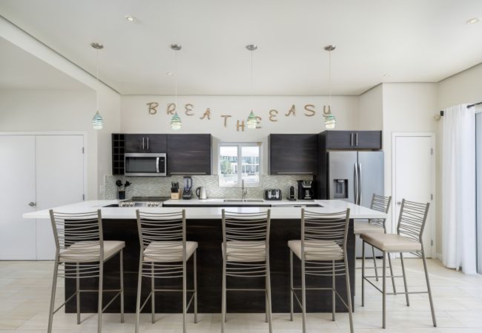 Kitchen island with breakfast bar seating