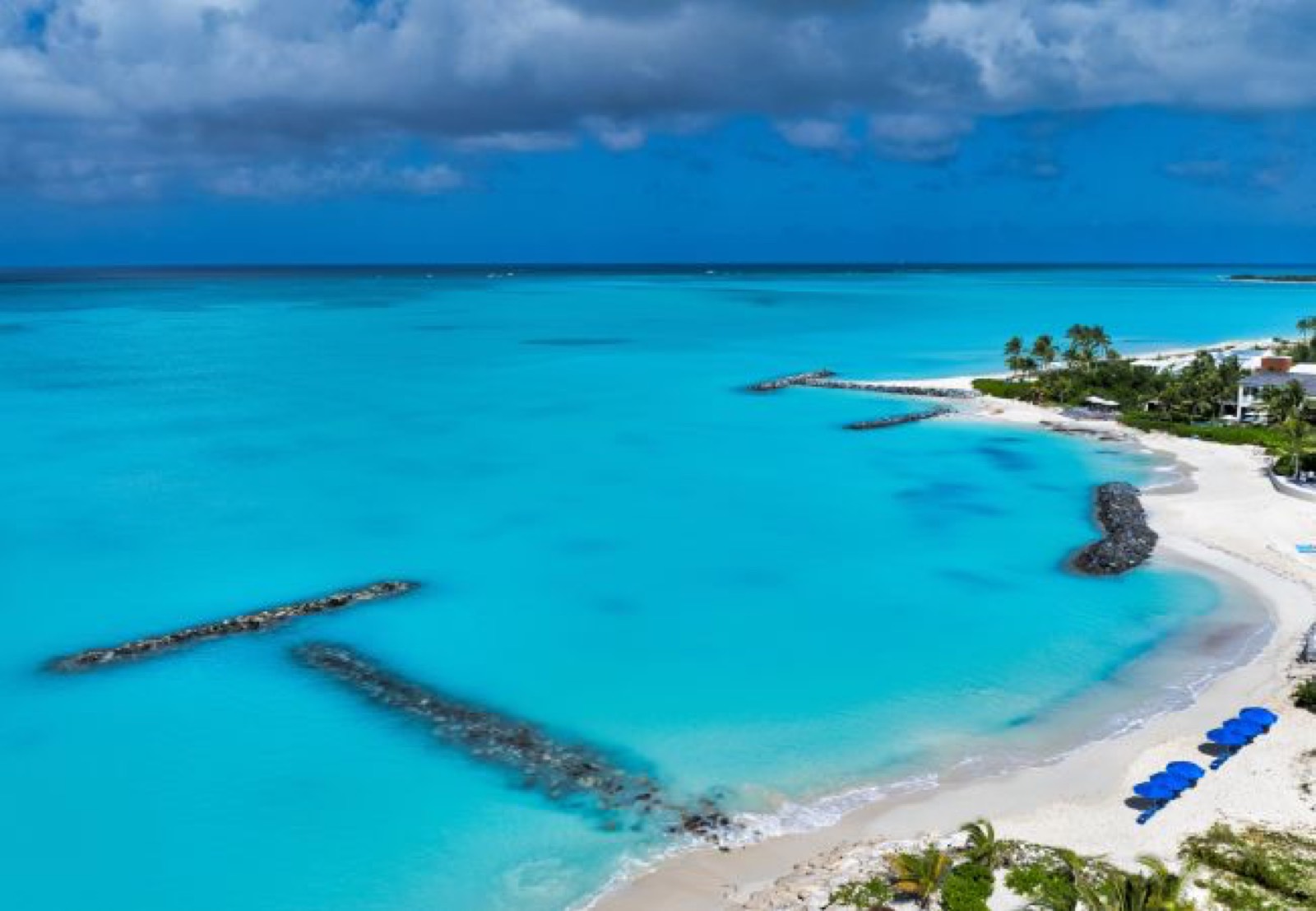 White sand and turquoise water along the shore