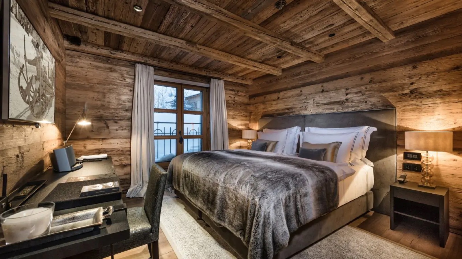 Bedroom with fur throw and corner writing desk