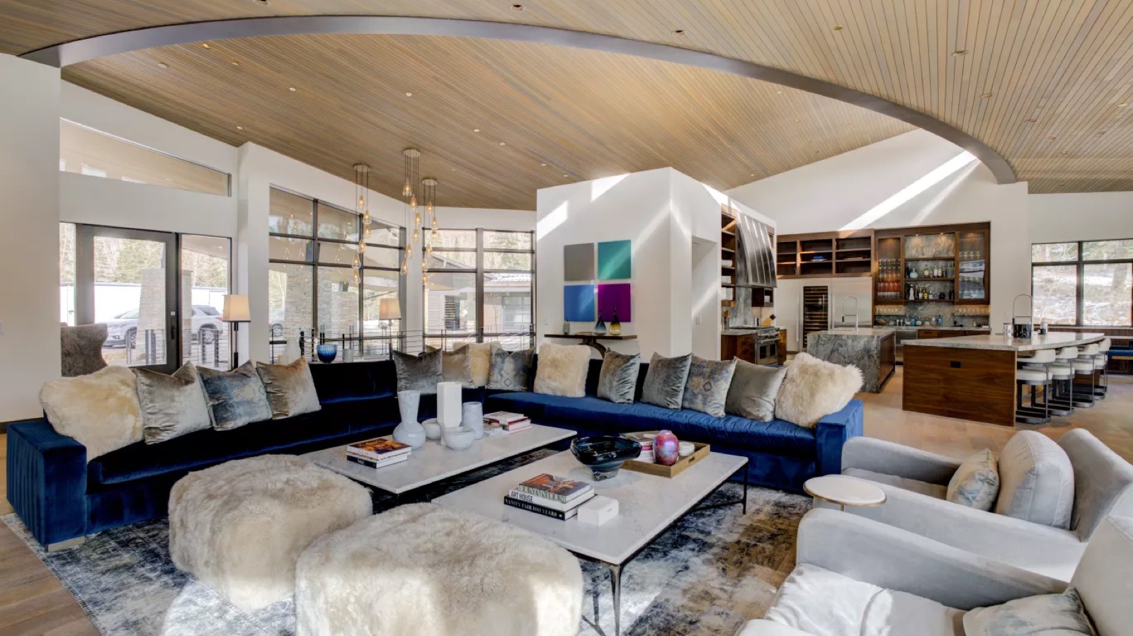 Great room beneath the curved timber ceiling