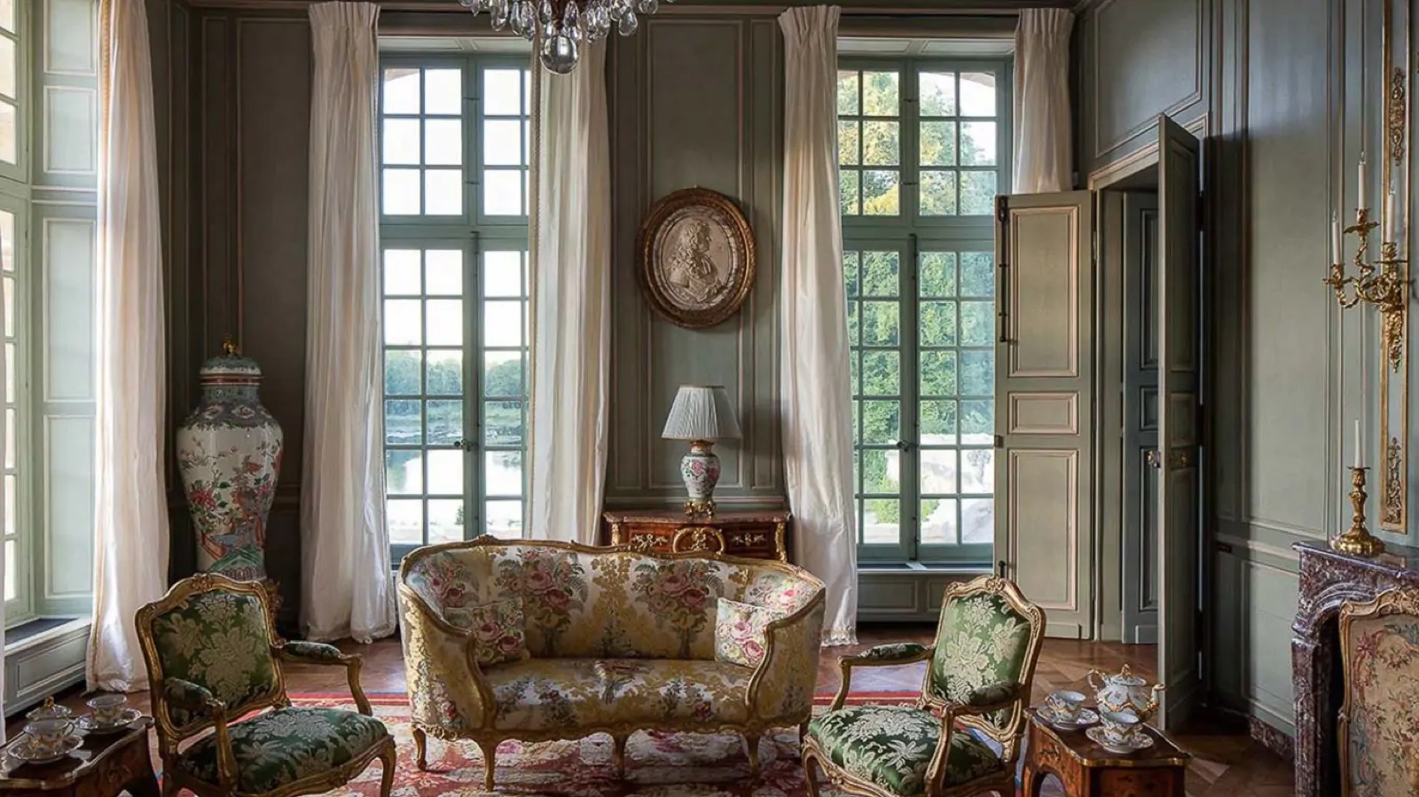 Drawing room with tall windows over the park