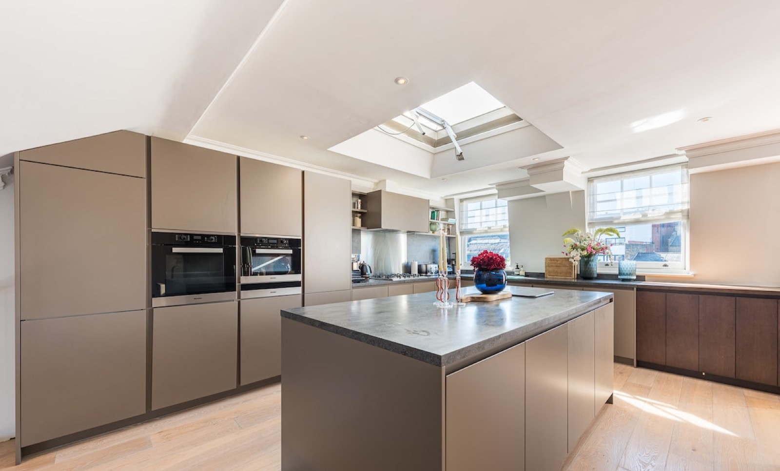 Kitchen island beneath the skylight