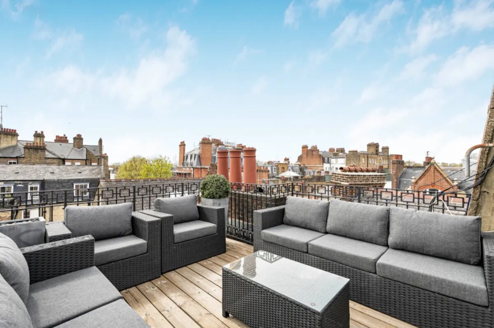 Terrace seating among the chimney pots