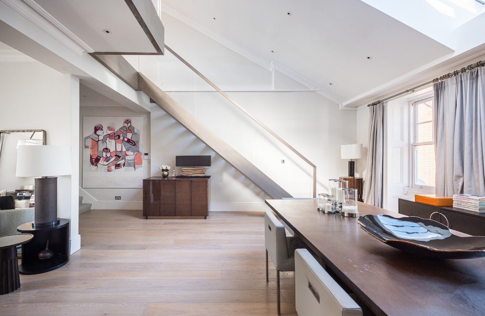 Timber staircase with glass balustrade