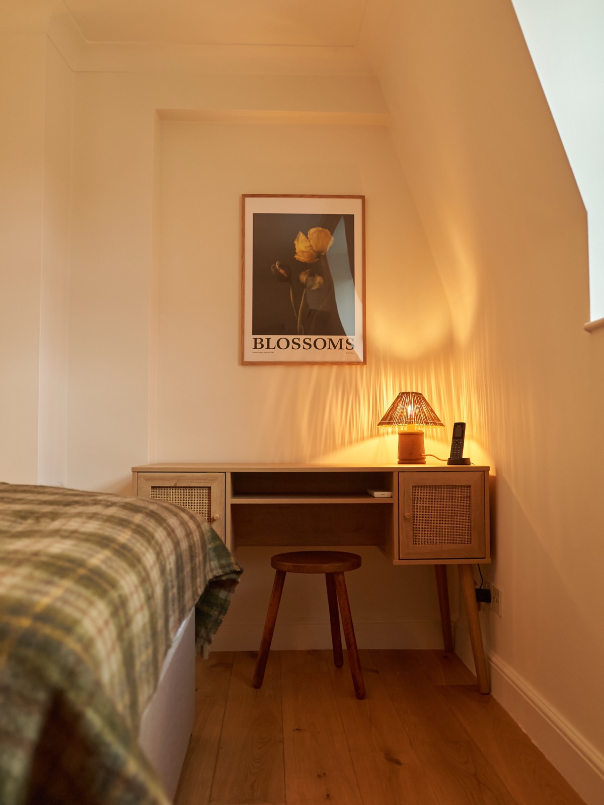 Cane desk and stool in the bedroom