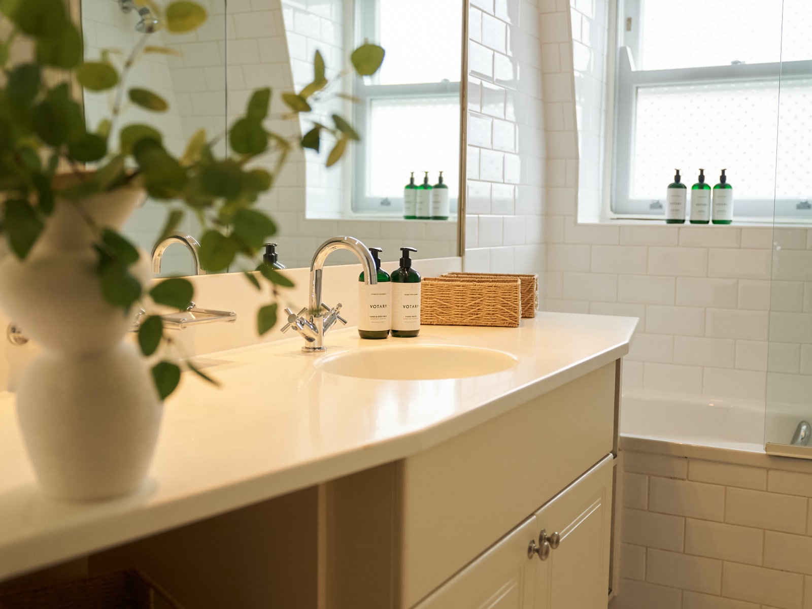Bathroom with bath beneath the window