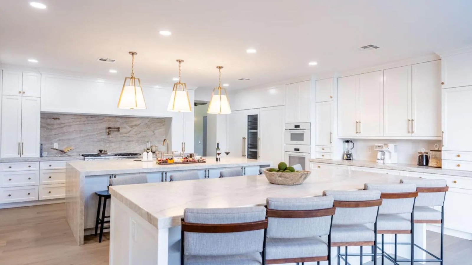 Kitchen with two islands and breakfast seating