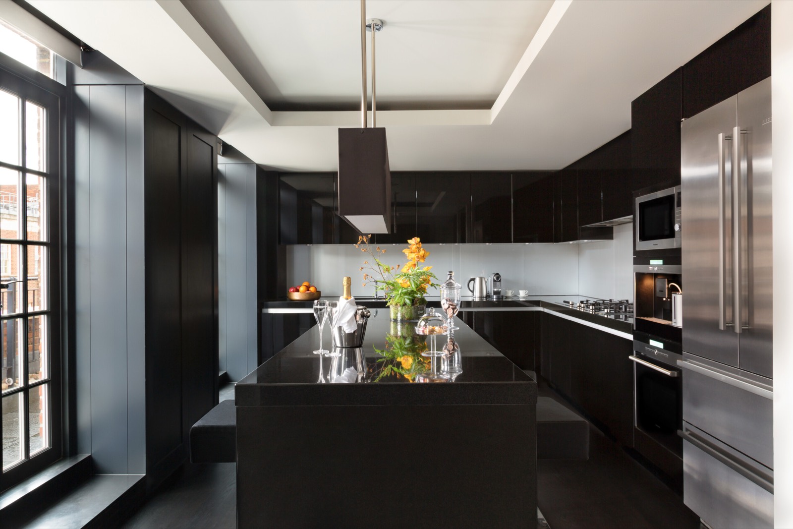 Kitchen with black granite island