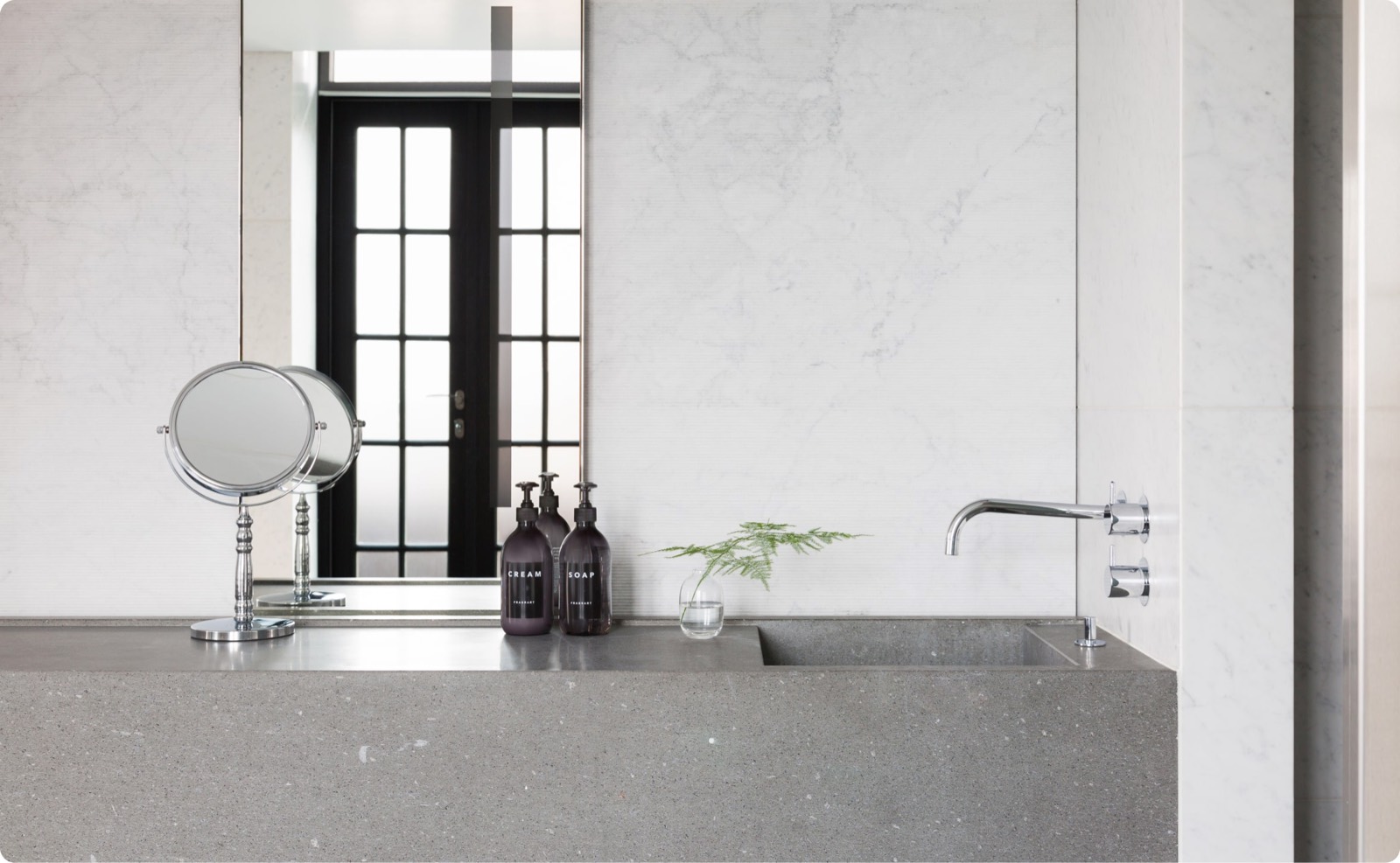 Bathroom basin in marble and grey stone