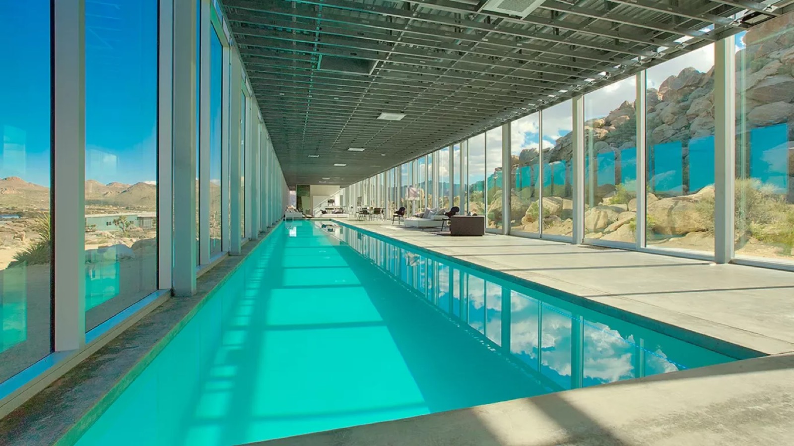 Indoor pool running the length of the house