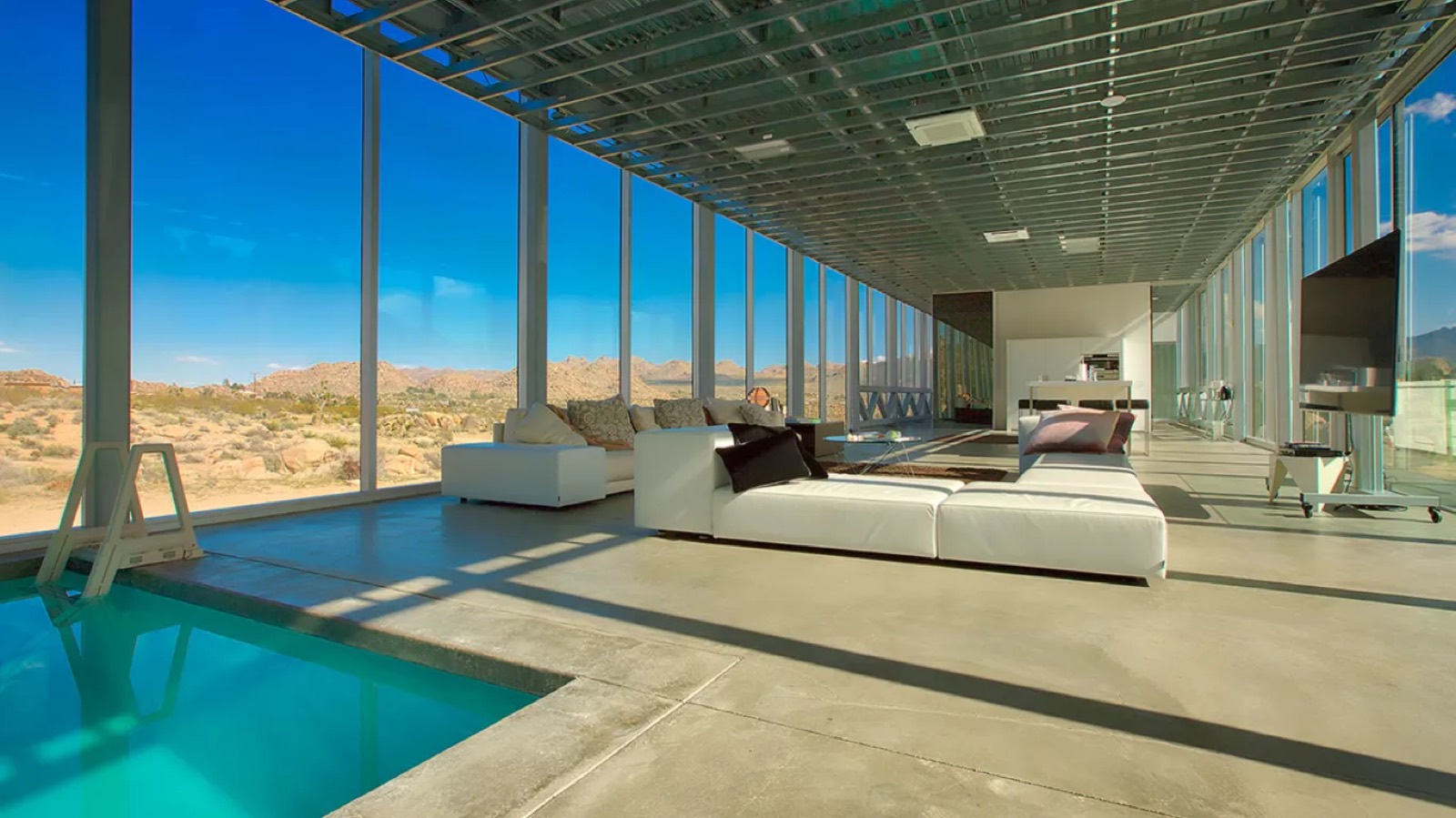 Living area beside the pool's edge