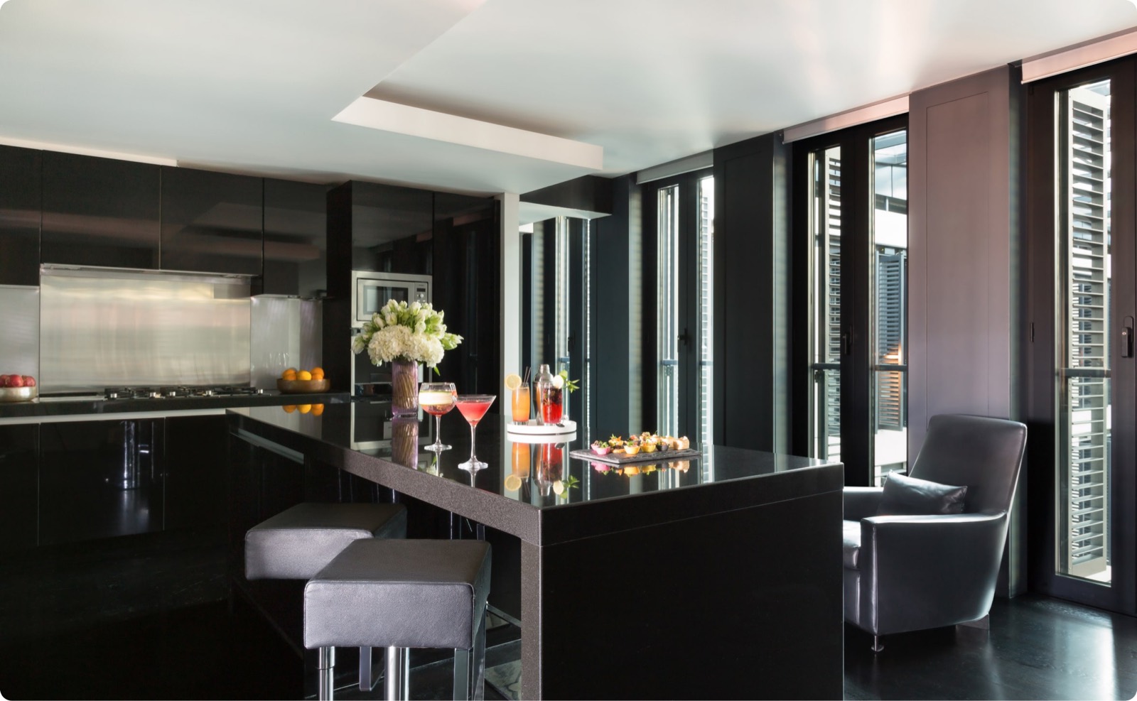 Kitchen with breakfast bar and terrace doors