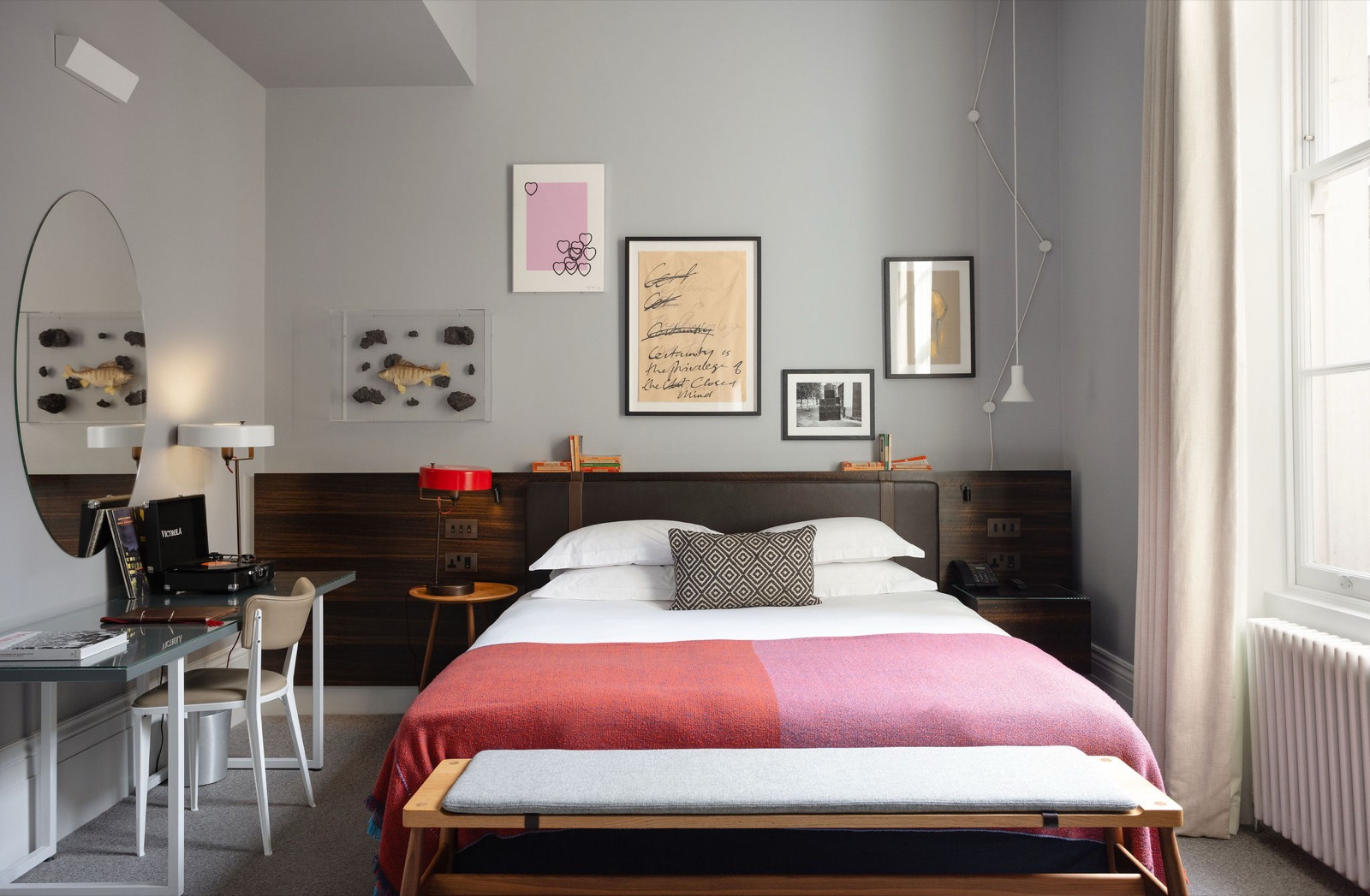 Bedroom with writing desk and dressing mirror