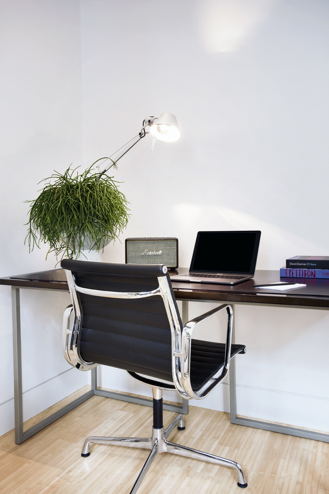 Writing desk with leather chair and reading lamp