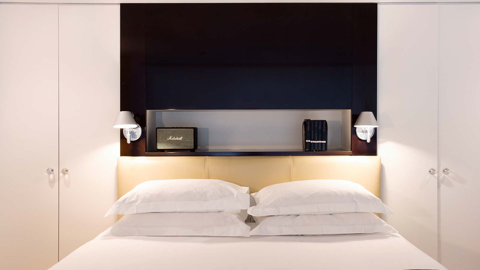 Bedhead with reading lights and speaker