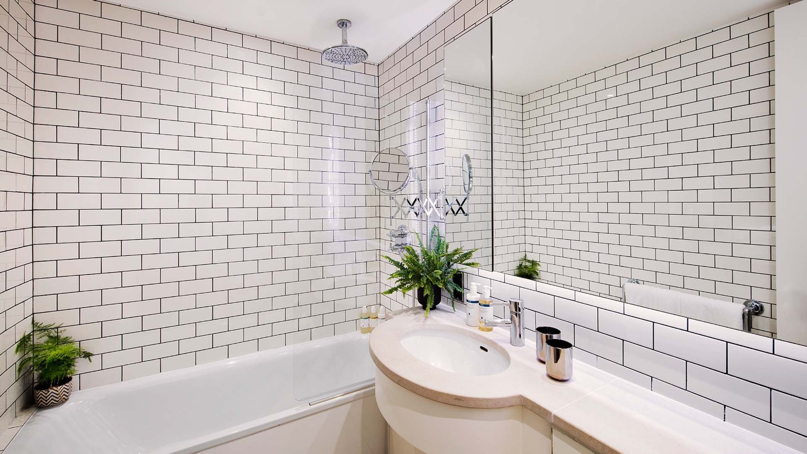 Bathroom with metro tiles and rainfall shower