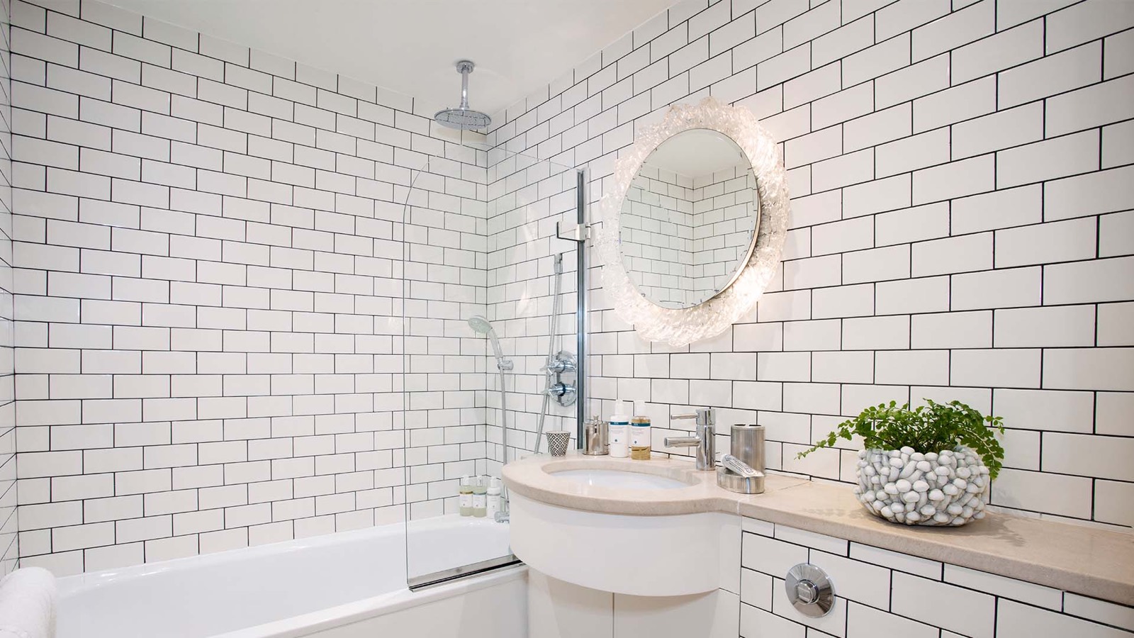 Bathroom with bath, shower and metro tiles