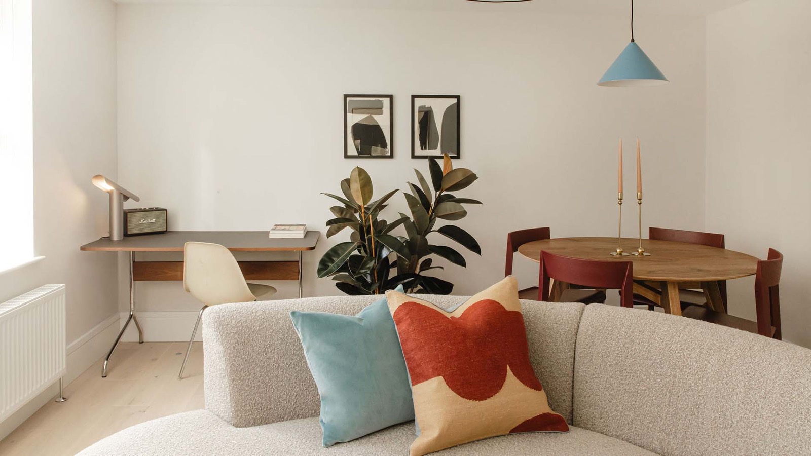 Sitting area with writing desk beyond