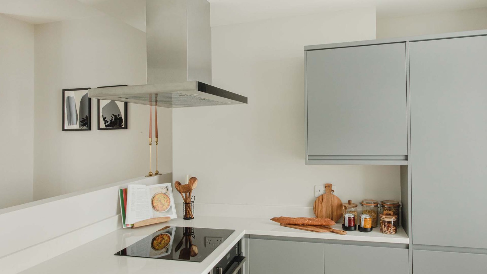 Induction hob under the steel extractor hood