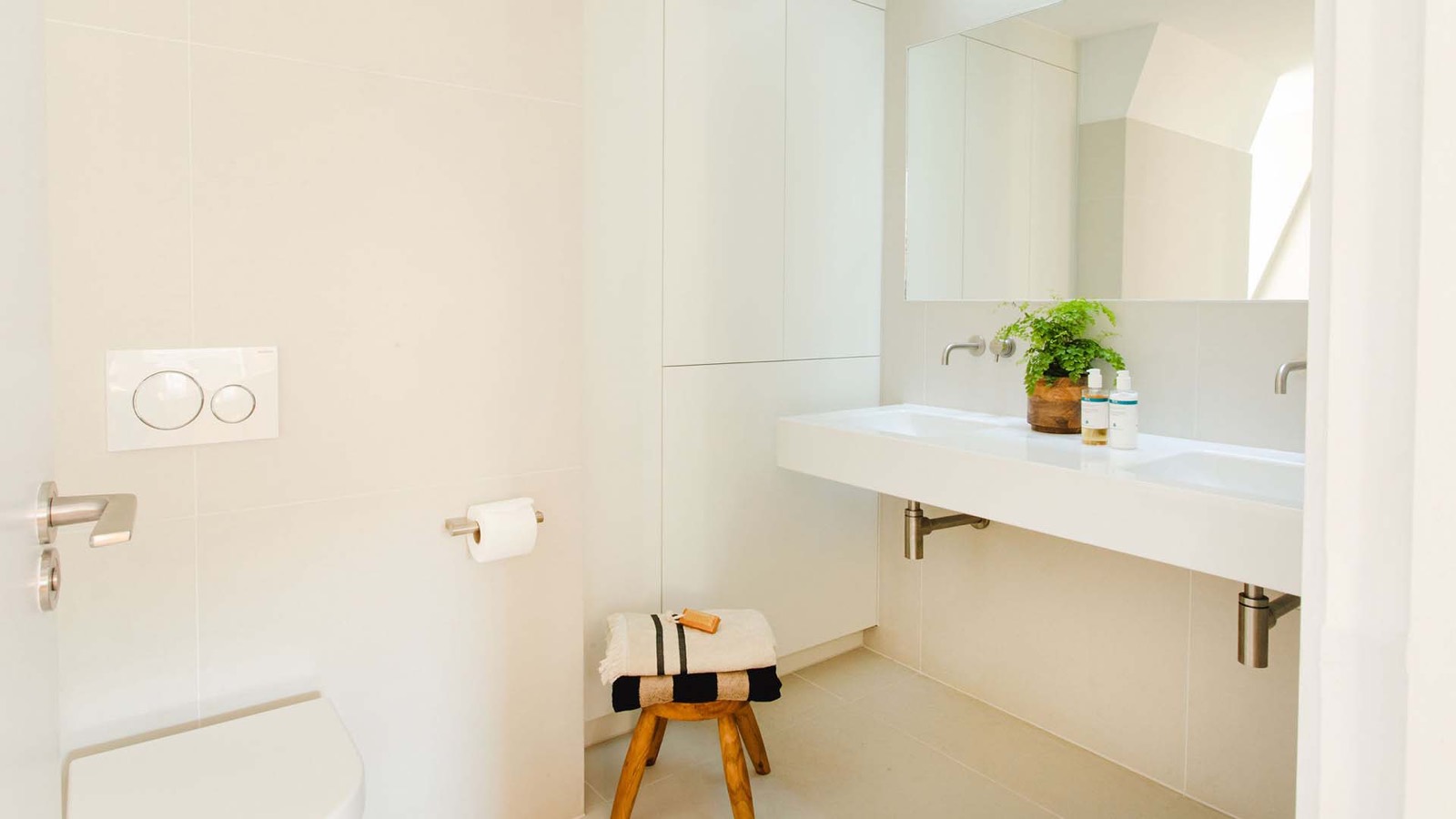 The family bathroom with fitted storage