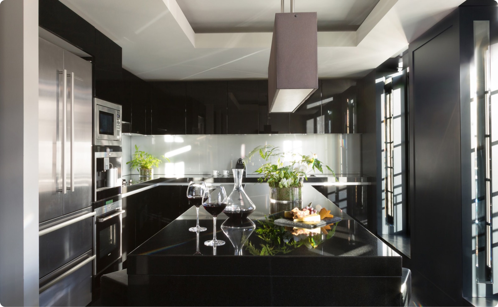 Kitchen with black granite island