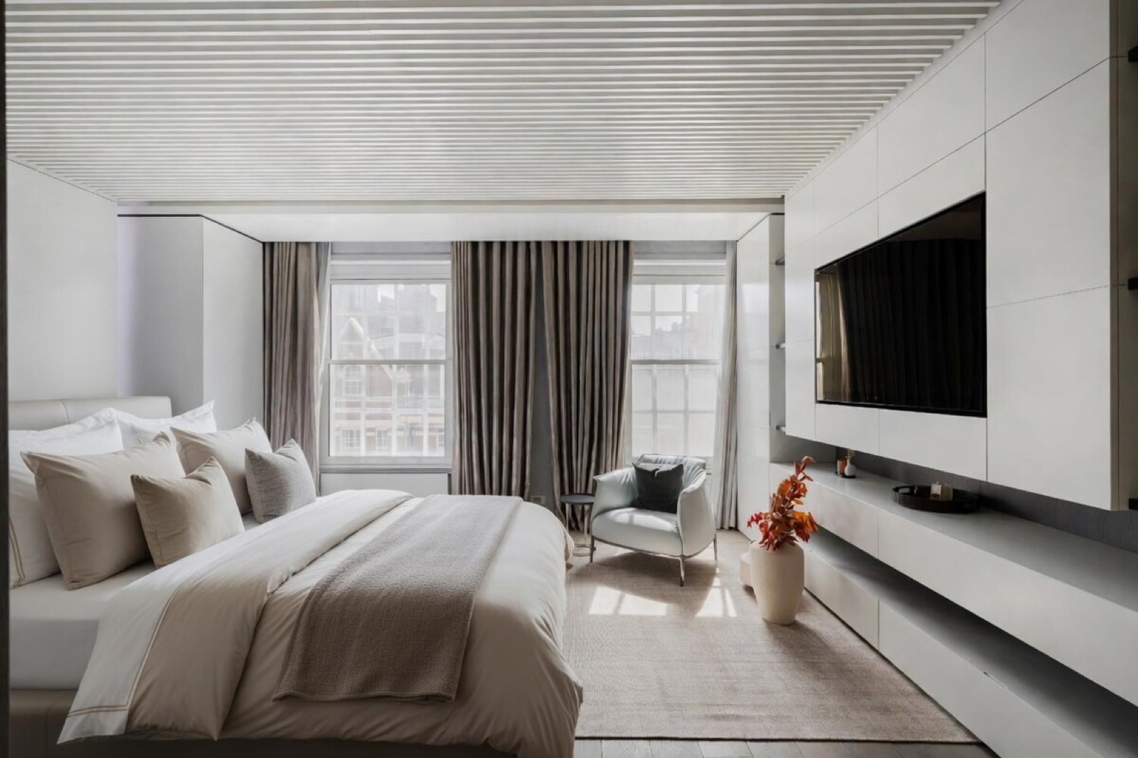 Principal bedroom with fitted media wall