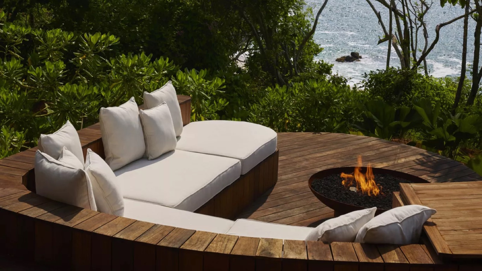Fire pit and daybed on the round deck