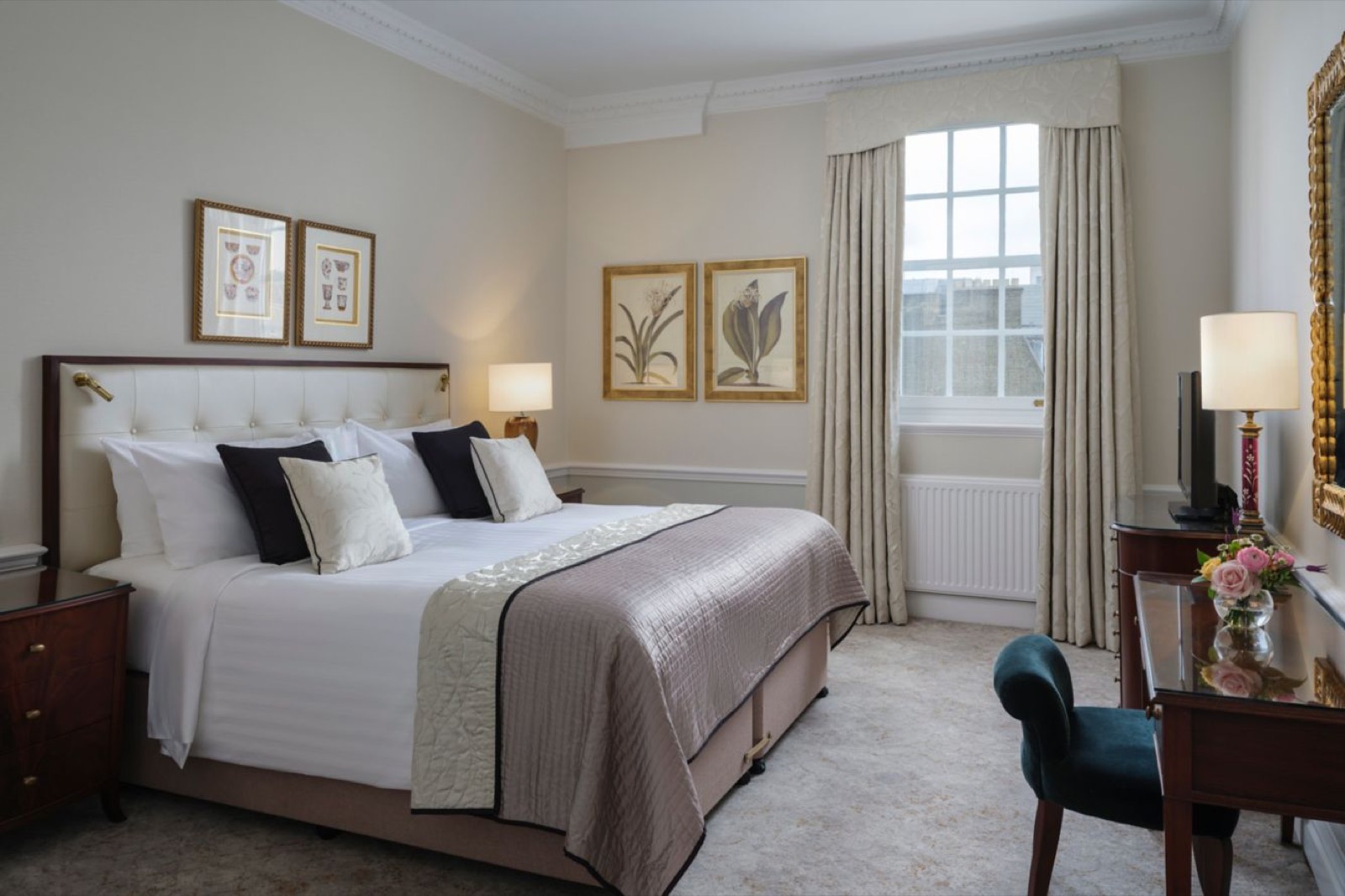Bedroom with writing desk and sash window