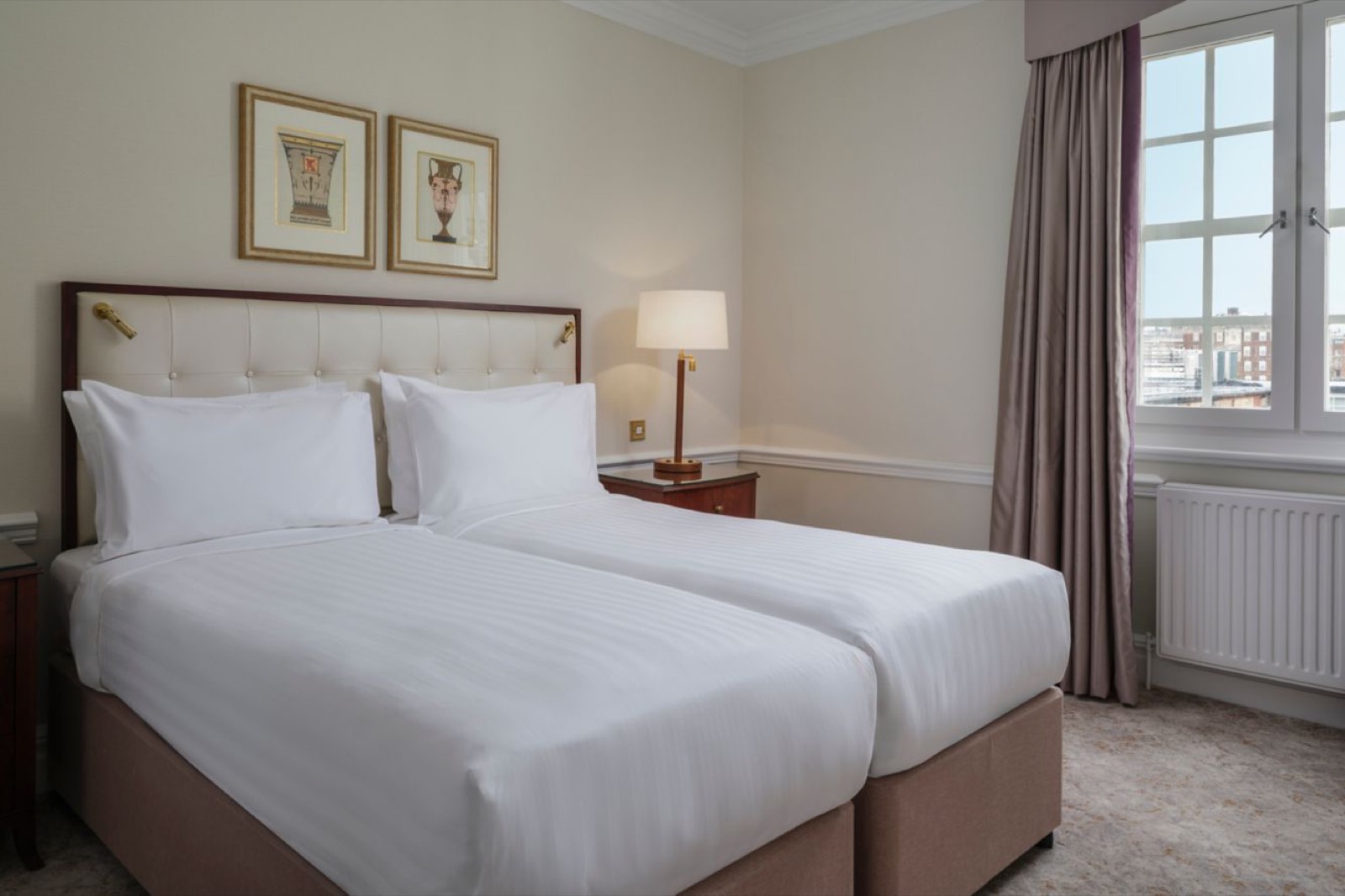 Second bedroom arranged with twin beds