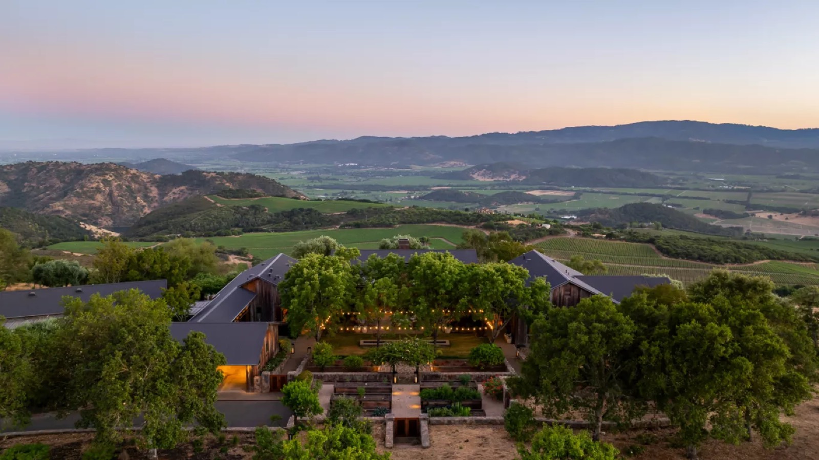 The estate above the valley at dusk