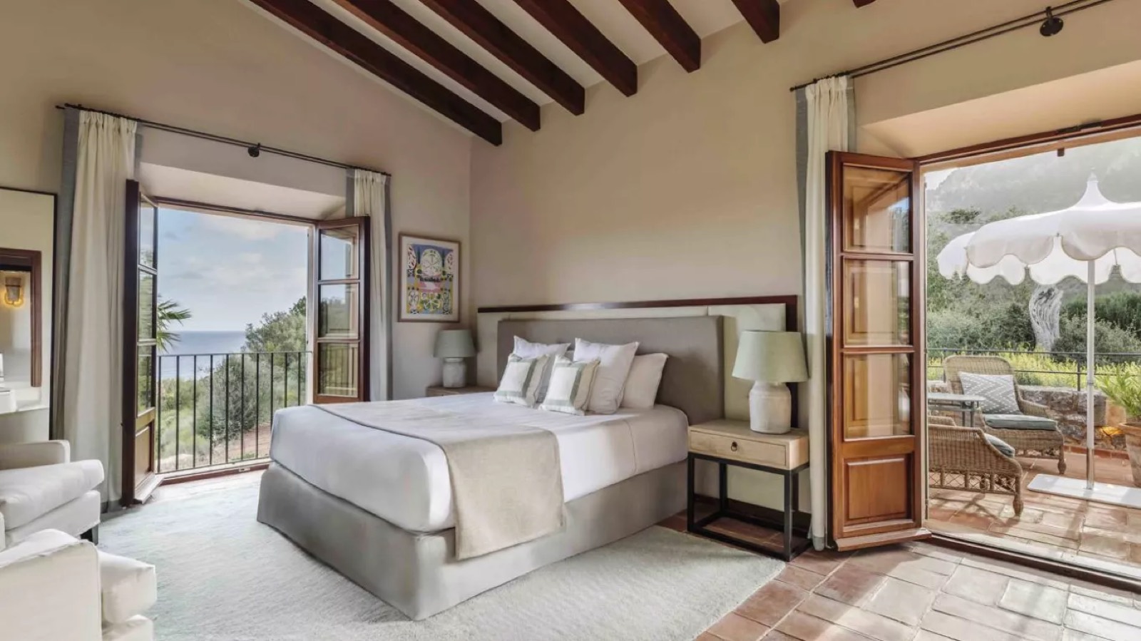 Bedroom opening onto a shaded terrace