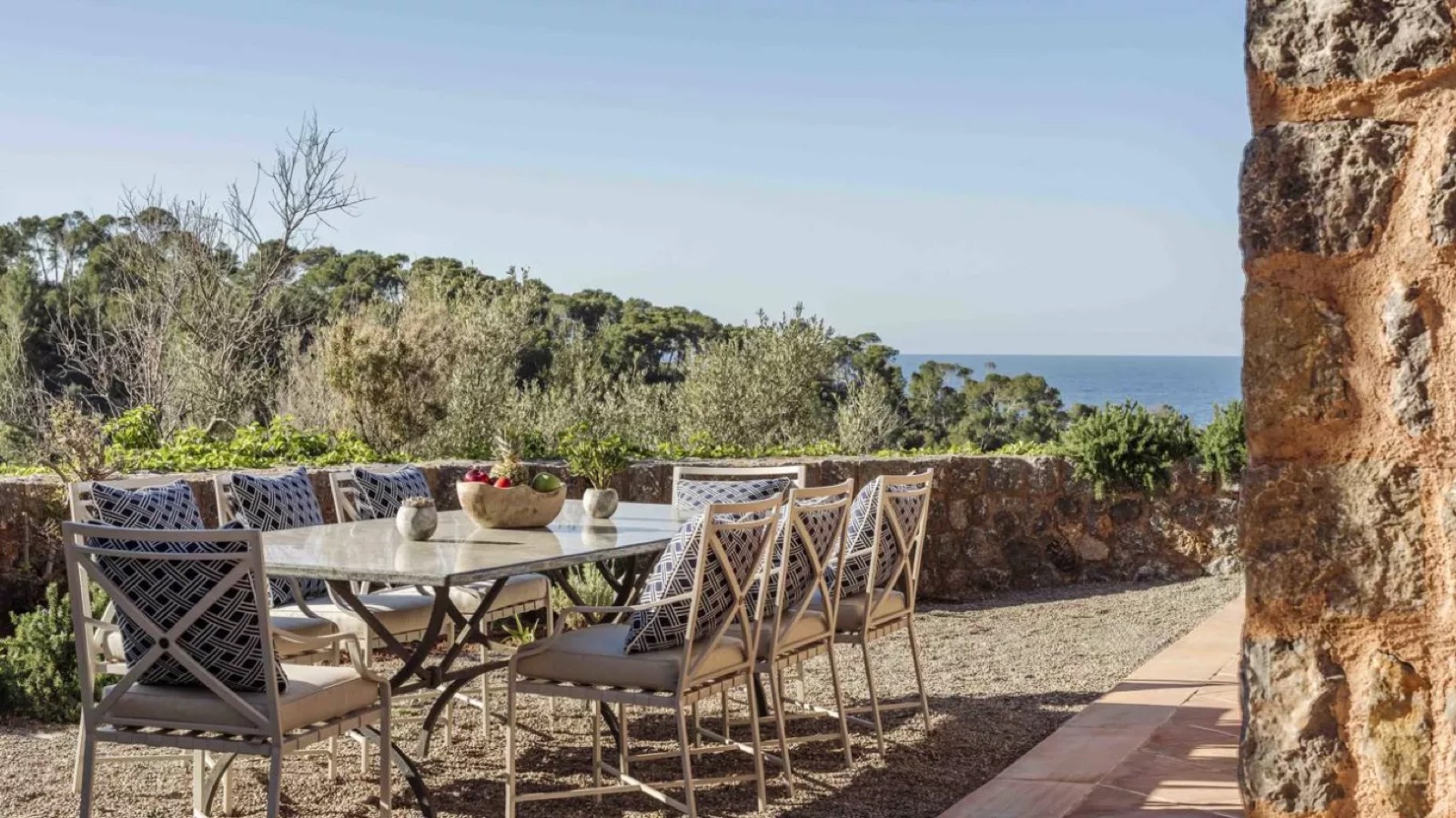 Al fresco dining table above the sea