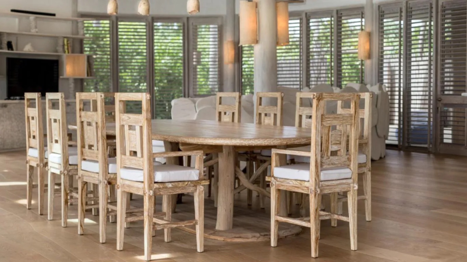 Dining table for ten under louvred shutters