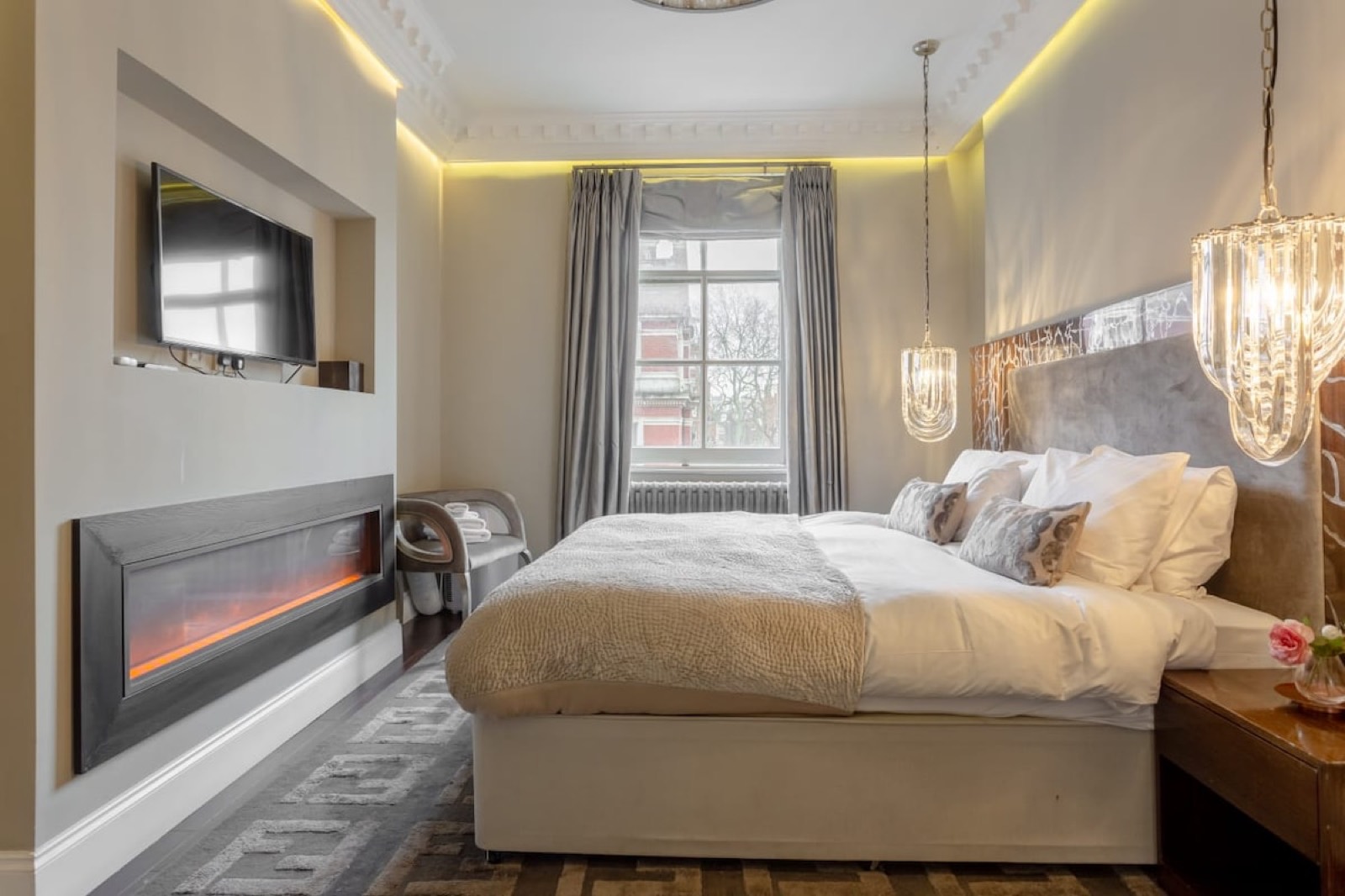 Bedroom facing the street, crystal pendants above
