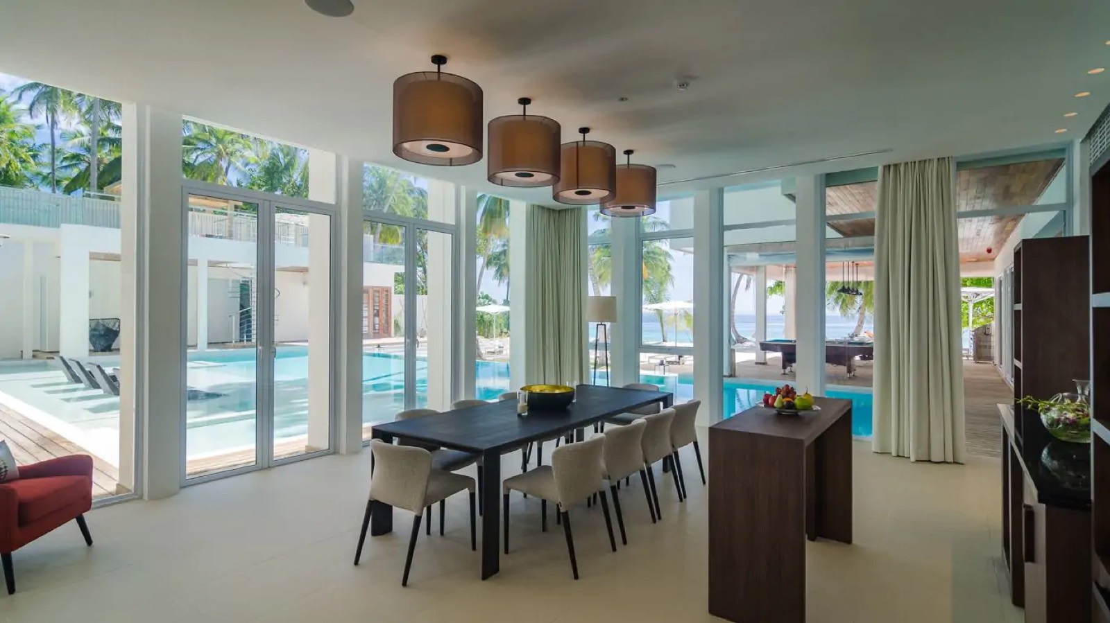 Dining table for ten beside the pool
